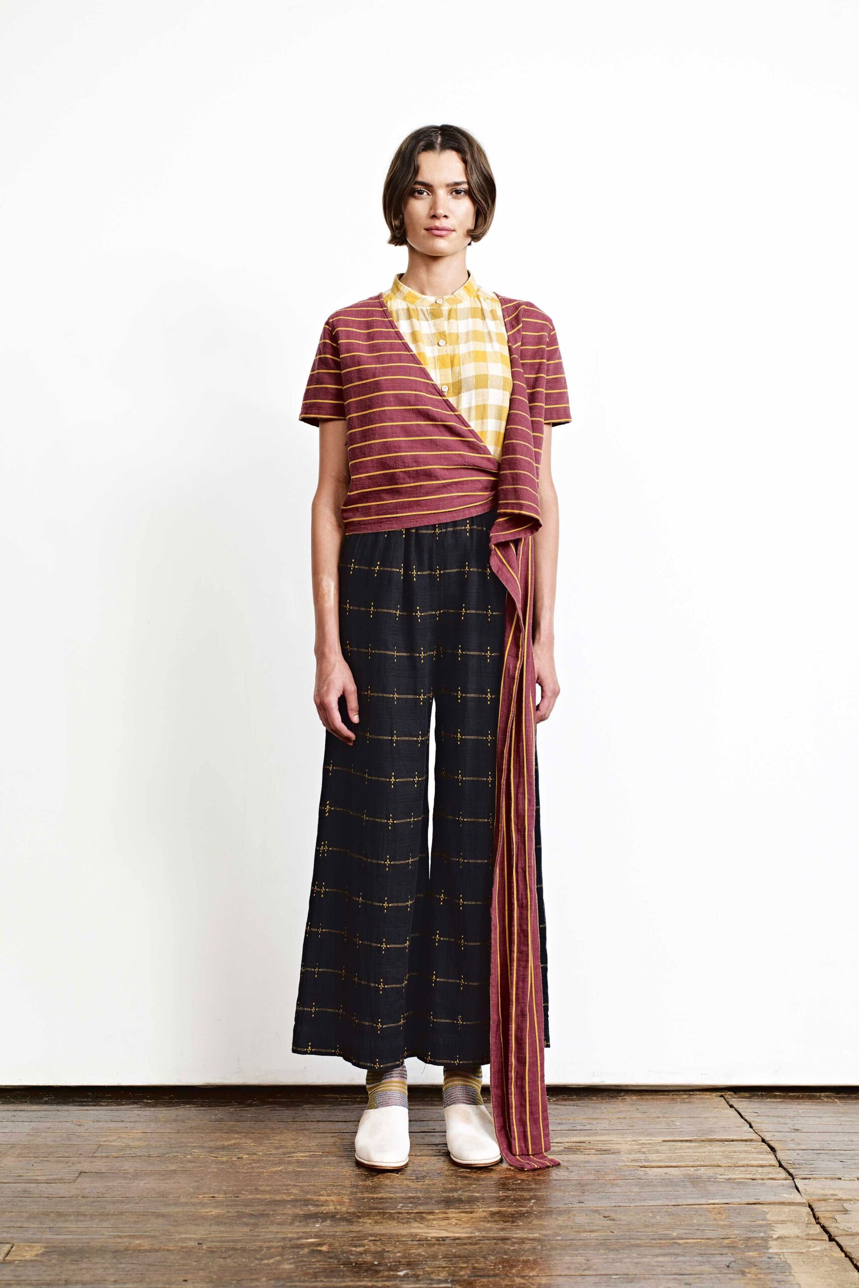 red striped top with black wide-leg pants