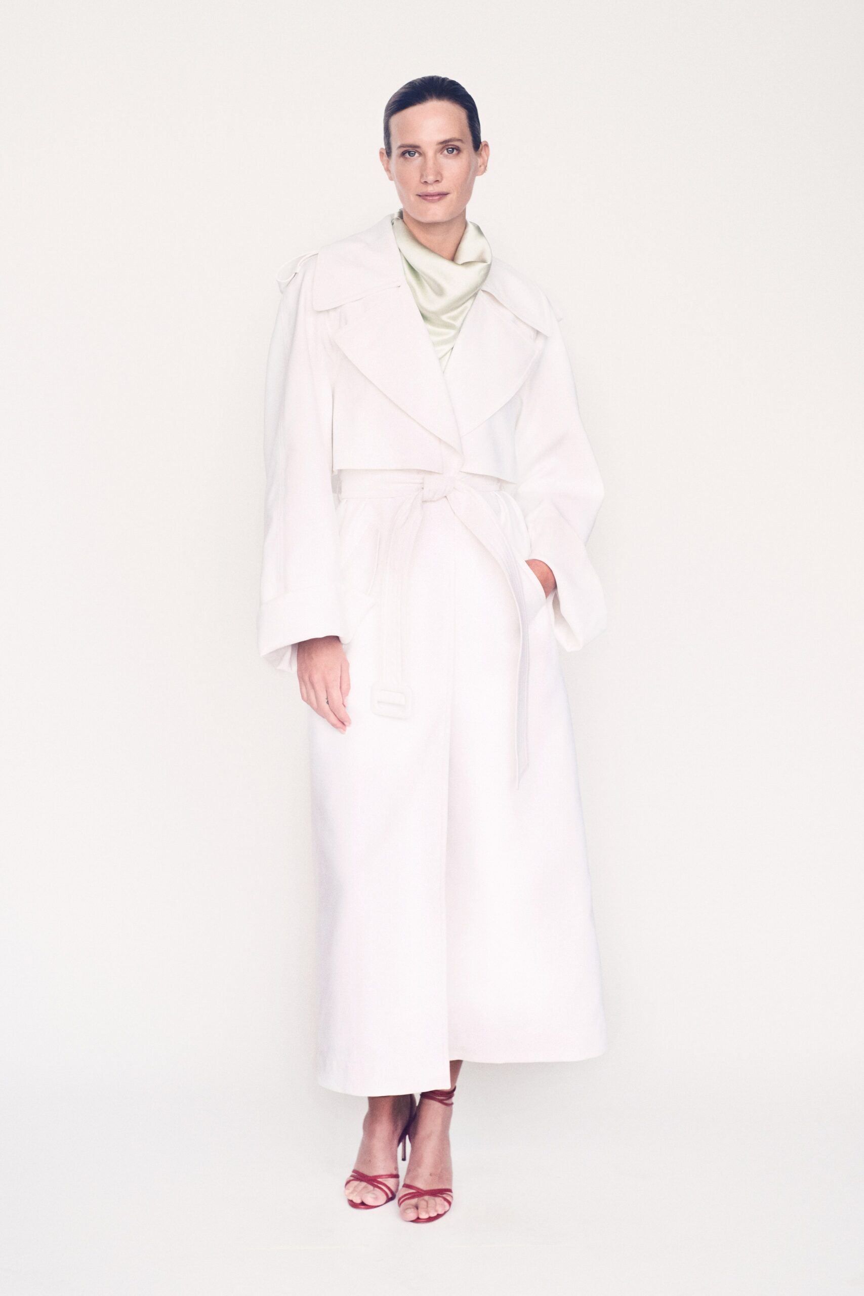 white relaxed coat with green top