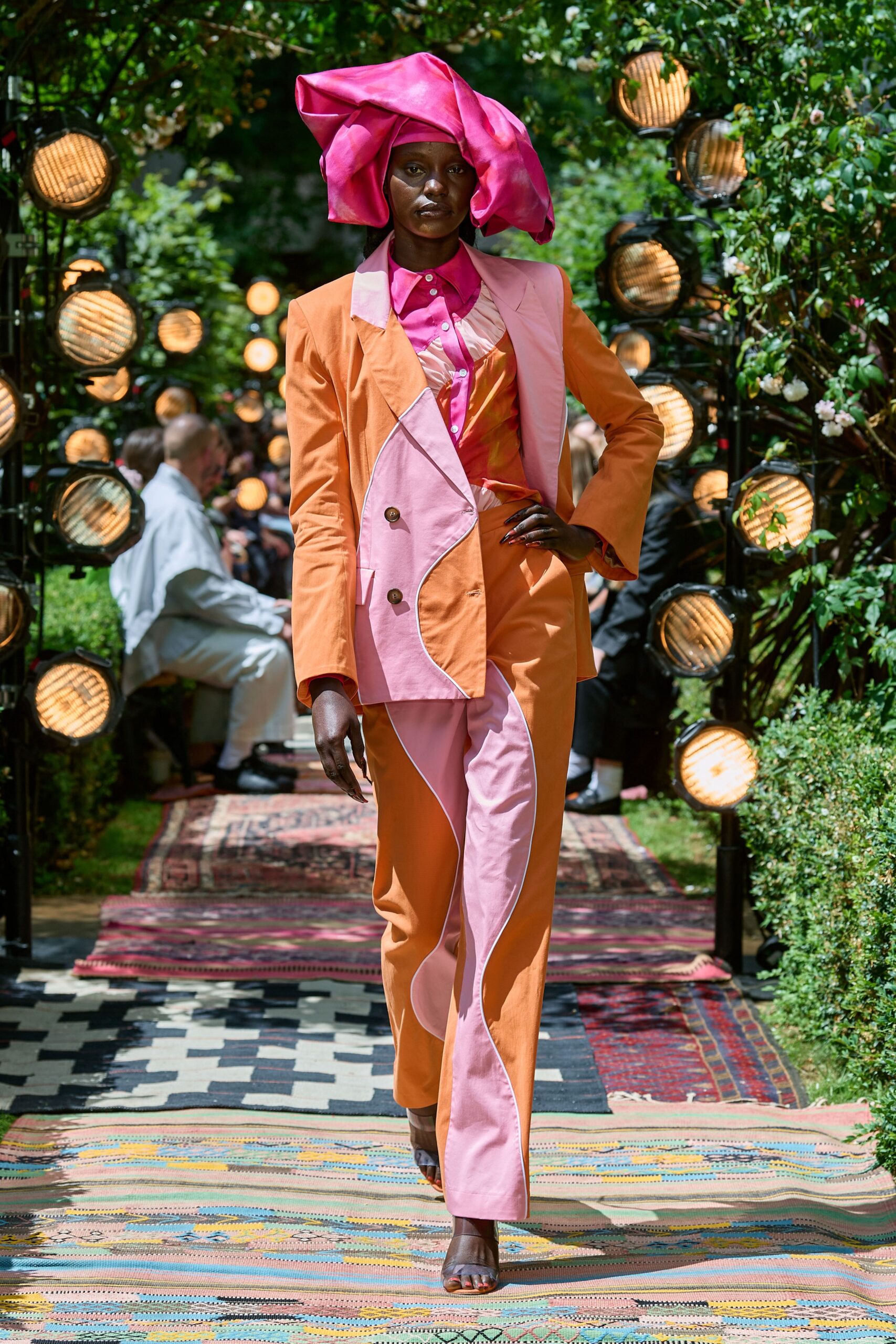 asymmetric orange and pink suit
