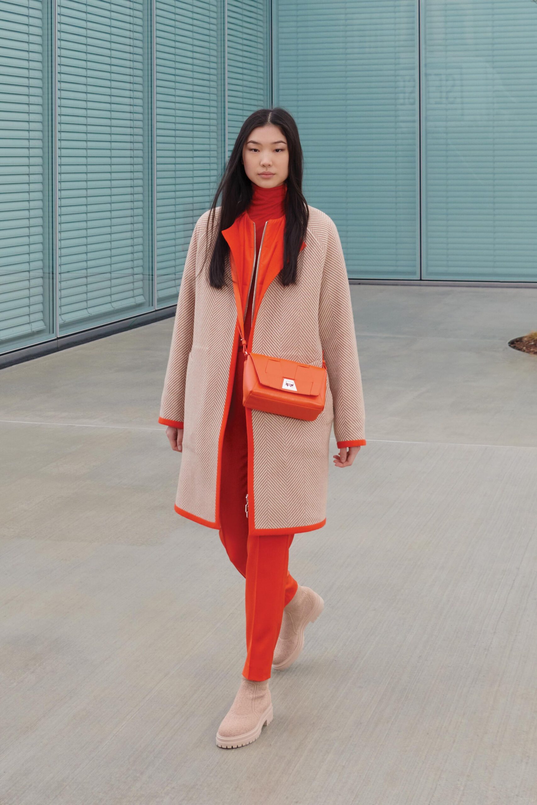 red cotton long-sleeve high-neck fitted jumpsuit