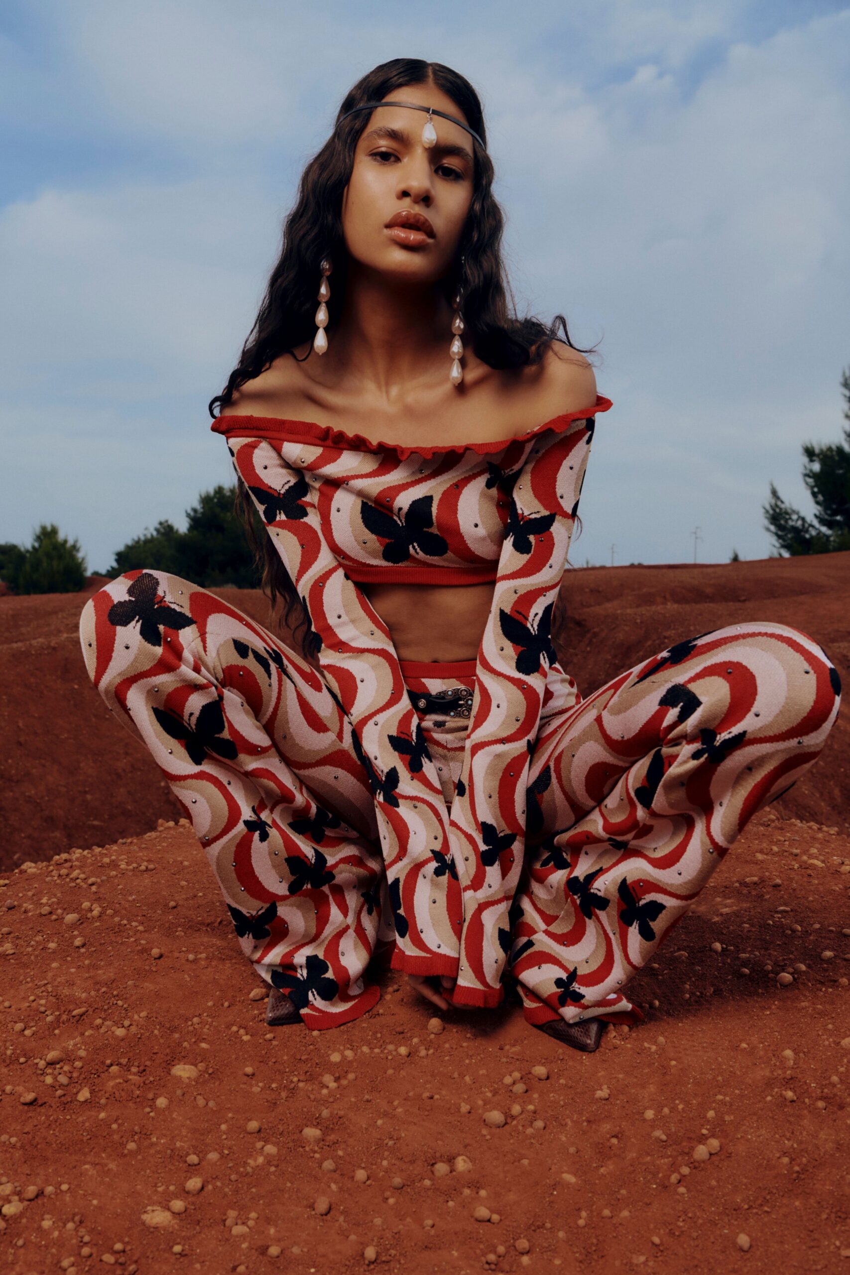 red cotton long-sleeve off-shoulder fitted flared top