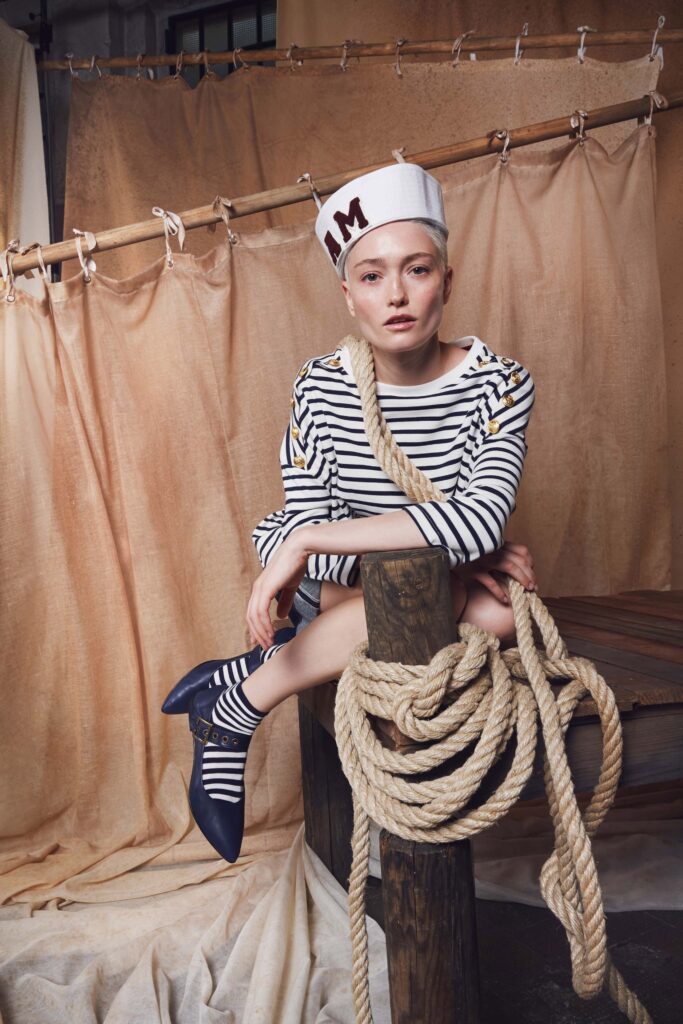 striped fitted top with blue shoes