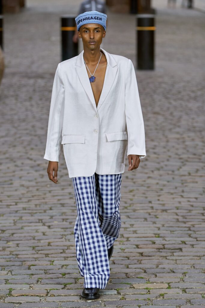 white blazer blue checked pants