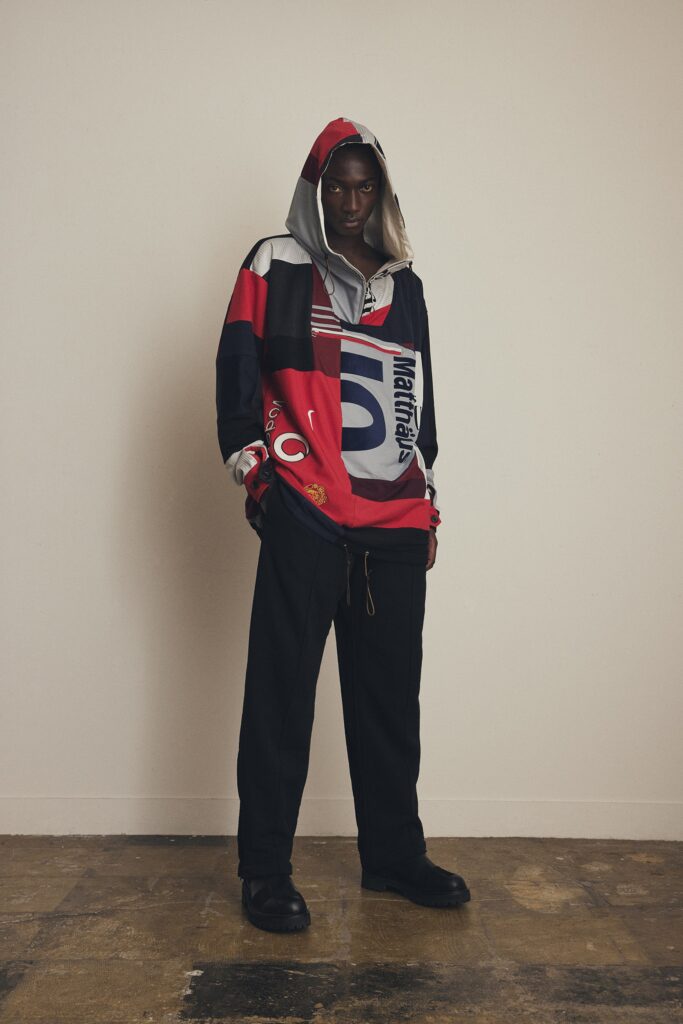 A relaxed fit color-blocked hoodie with long sleeves paired with relaxed pants.