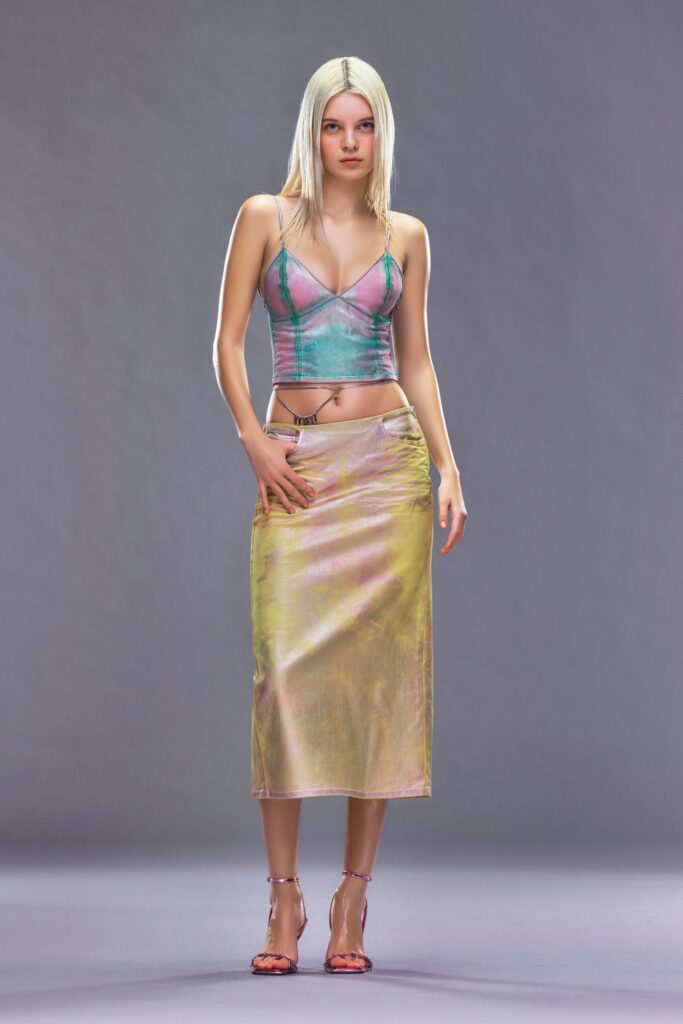 A fitted pink silk sleeveless top with a V-neck and an asymmetric yellow skirt.