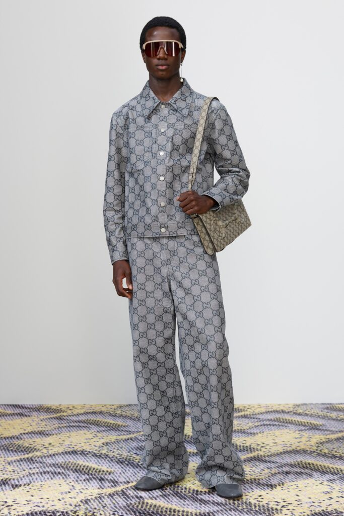 A relaxed gray cotton long-sleeve collared shirt paired with printed pants.