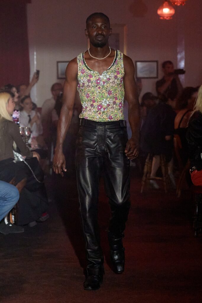 multi-colored tank-top and black leather pants