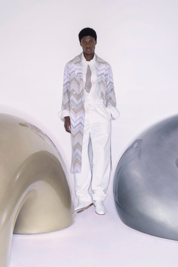 A relaxed white coat with a striped pattern paired with matching pants.