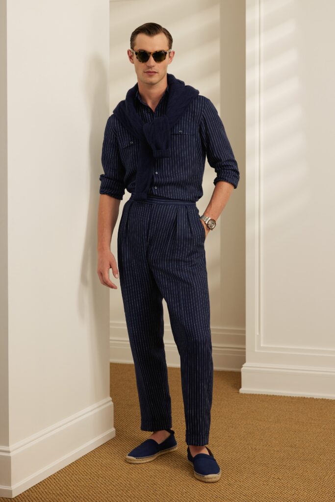 A tailored blue cotton long-sleeve shirt with striped design paired with matching pants.