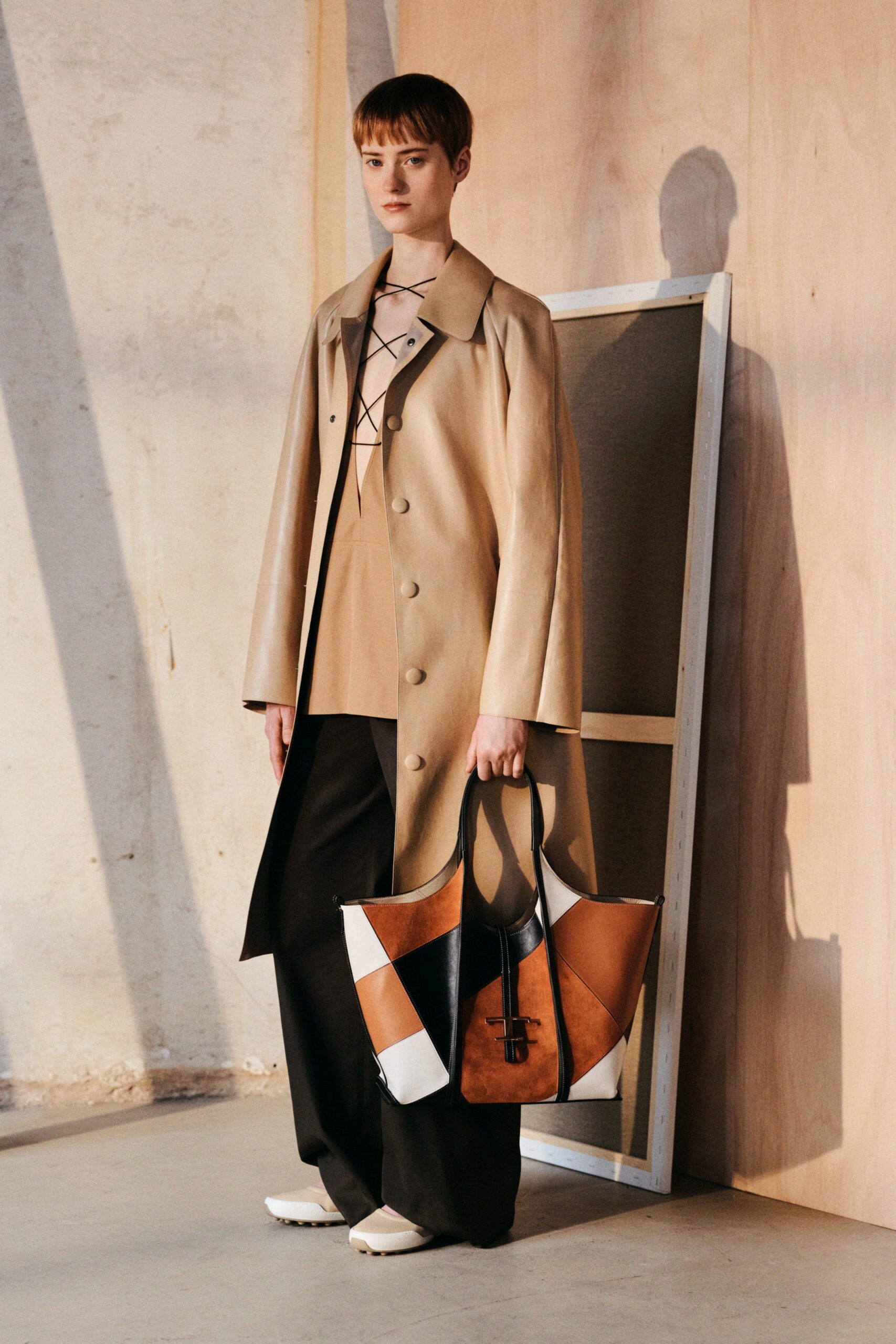 beige leather coat with brown top