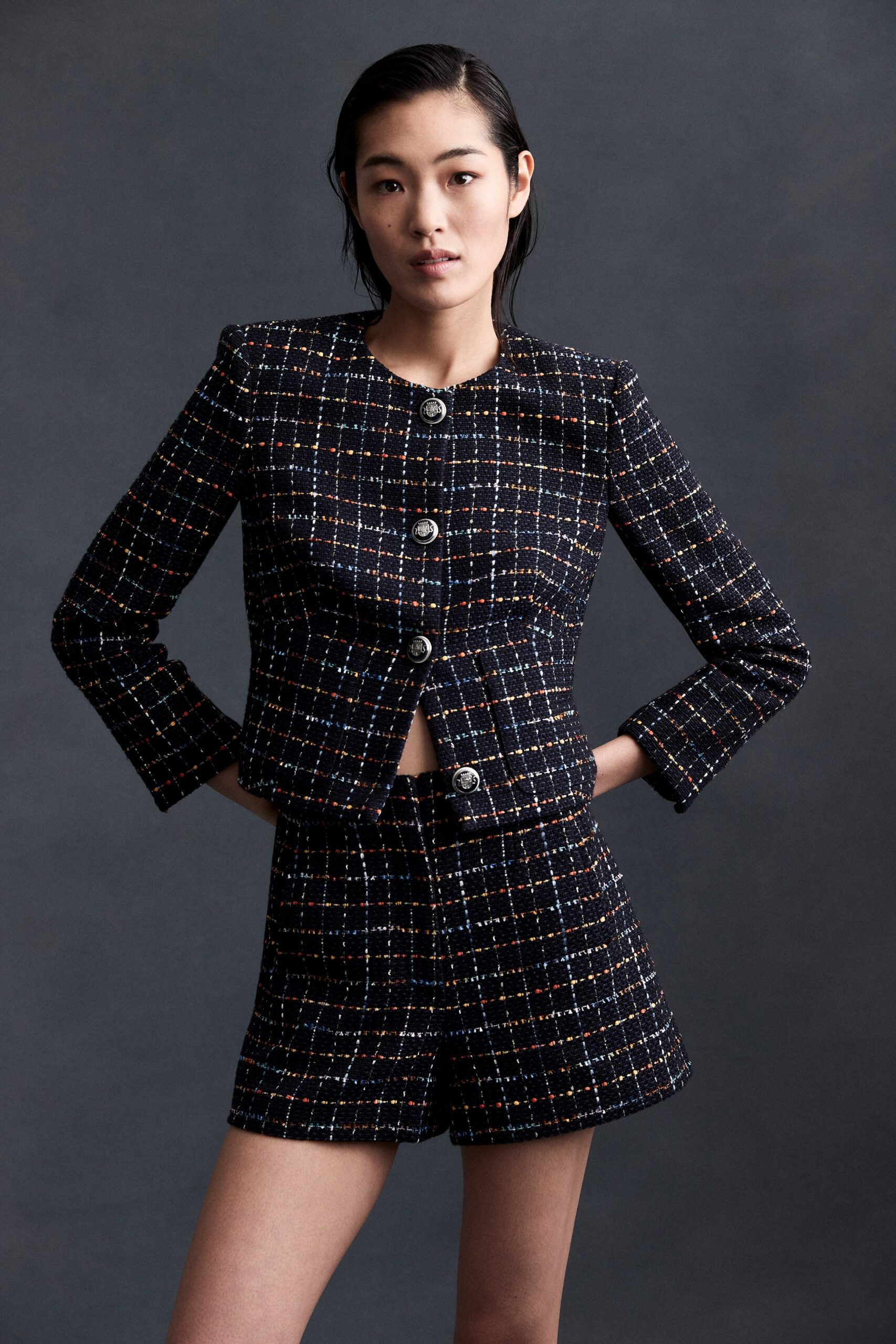 fitted black tweed jacket and shorts