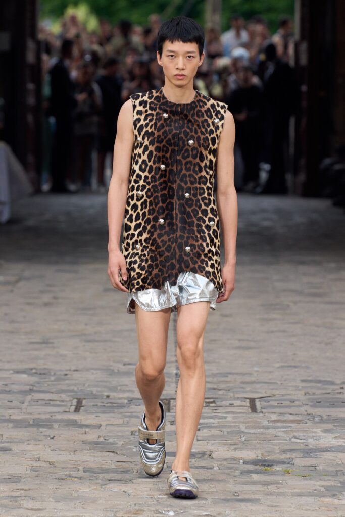 animal-print top with silver shorts