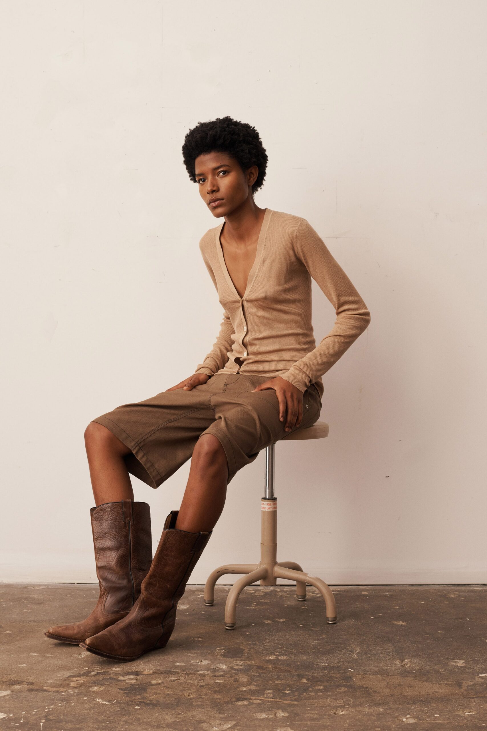 beige cardigan with brown shorts