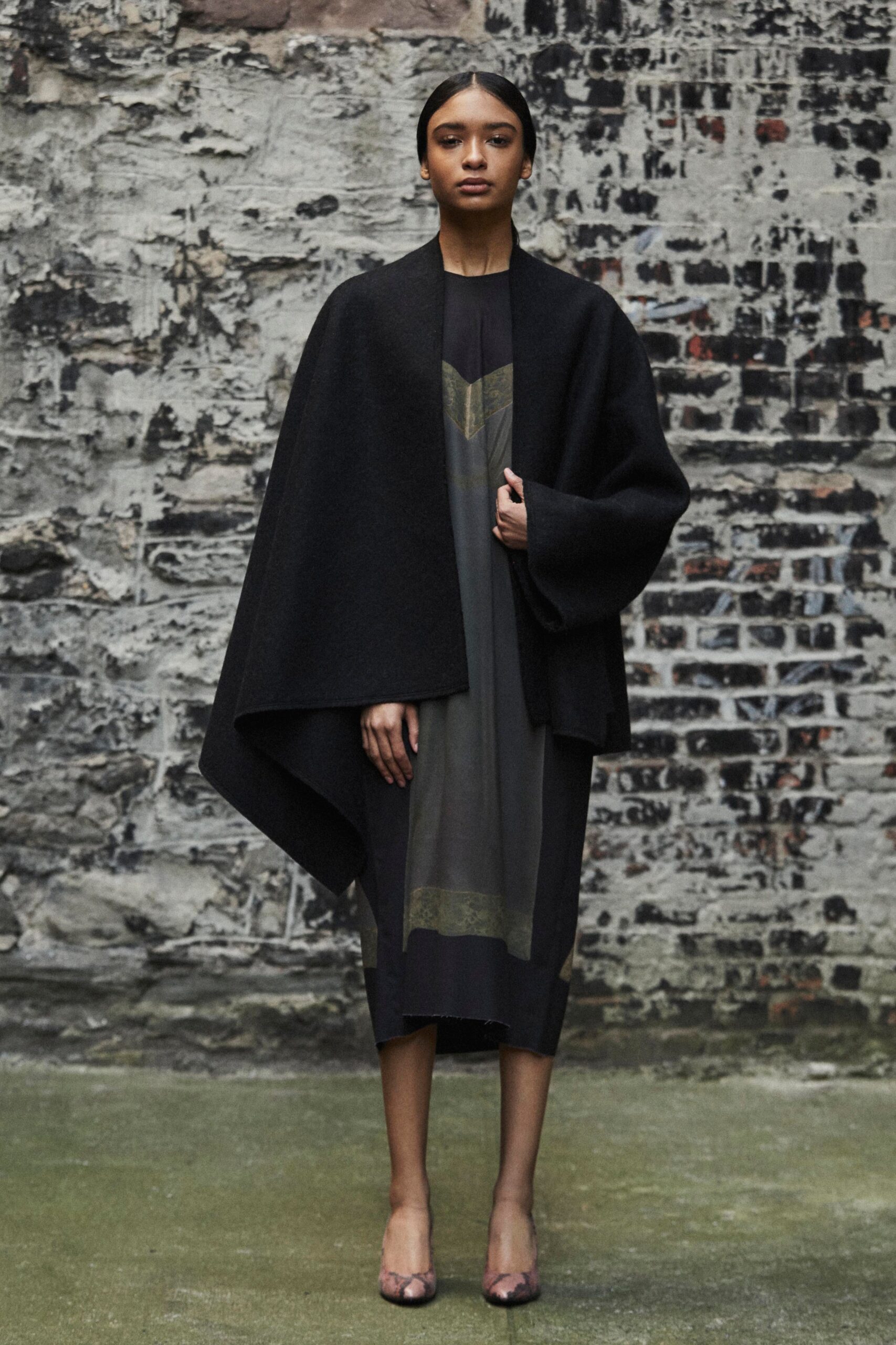 black wool cape and silk dress
