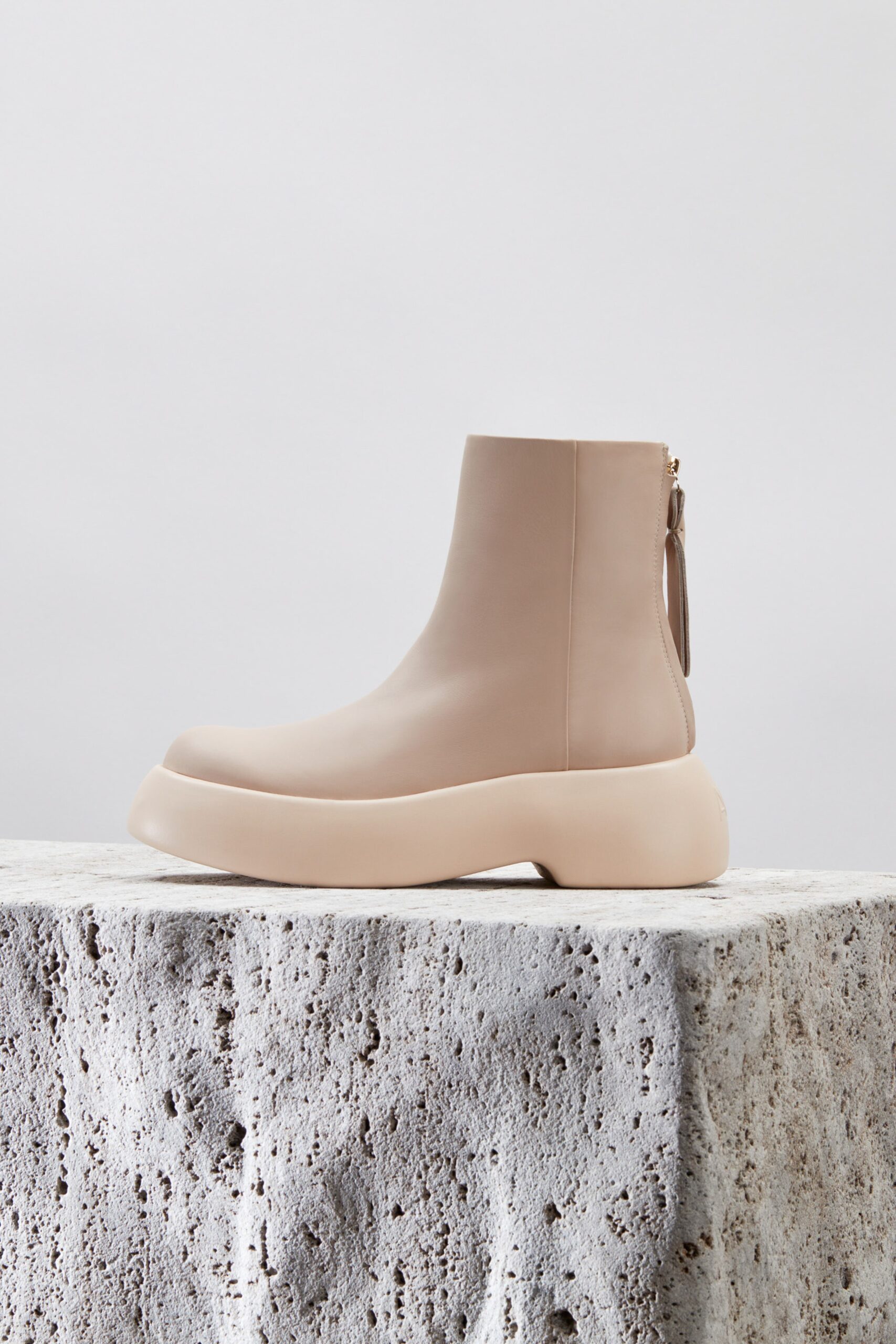beige leather fitted boots