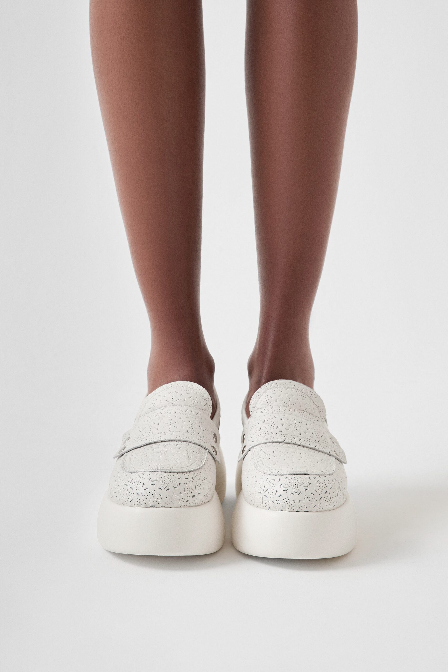 white textured leather shoes