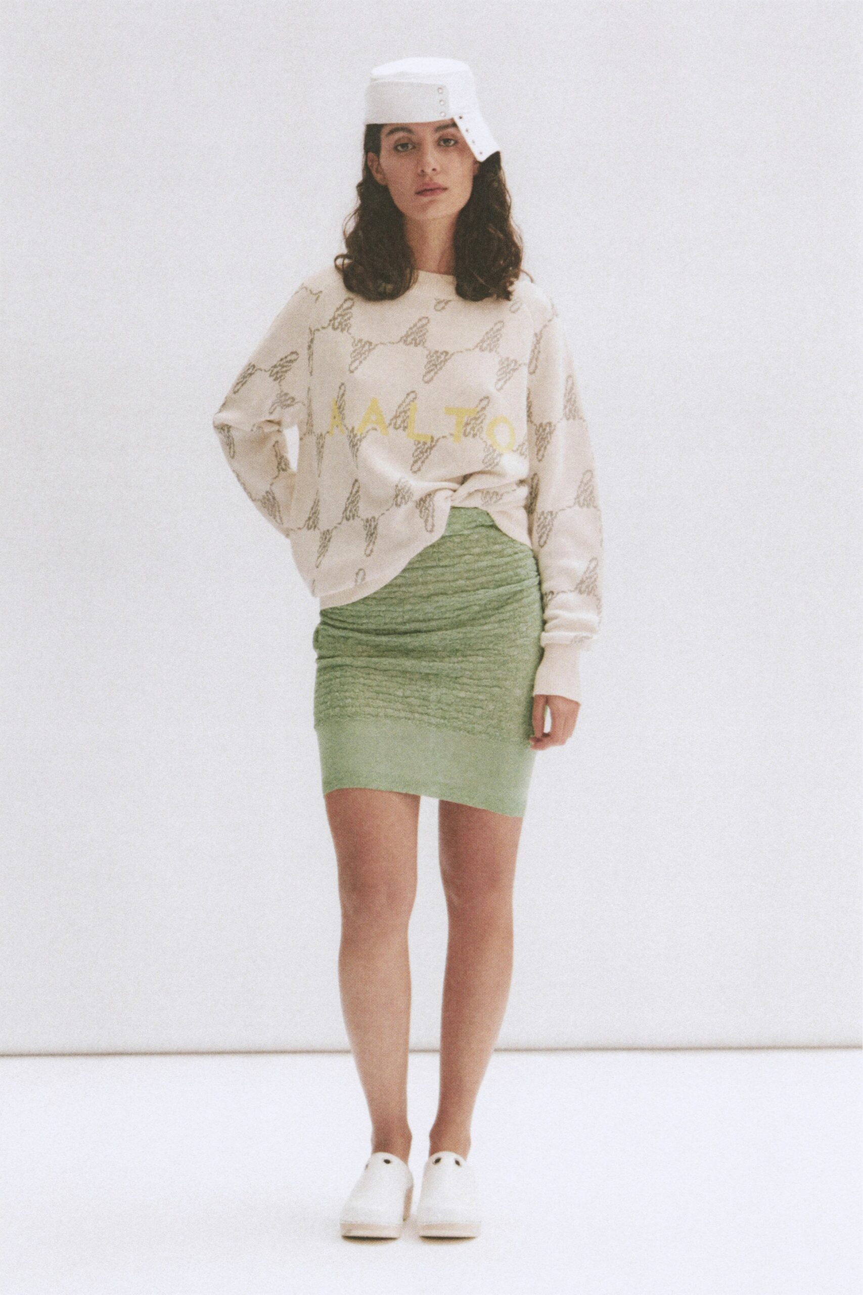 beige sweater green mini skirt