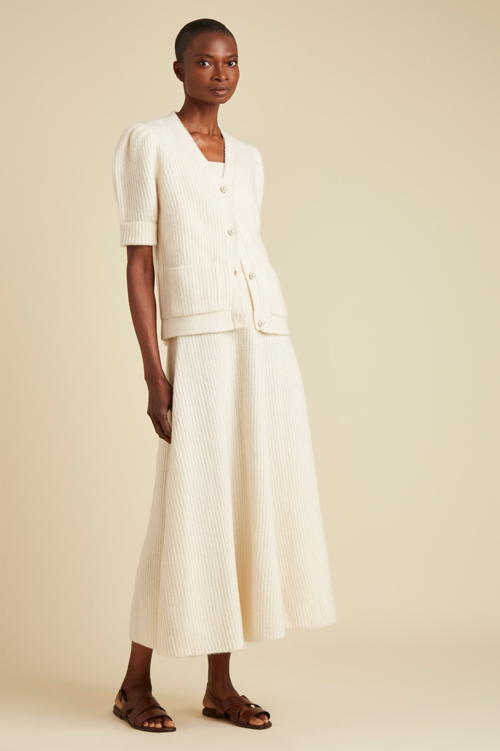 white cotton cardigan and skirt