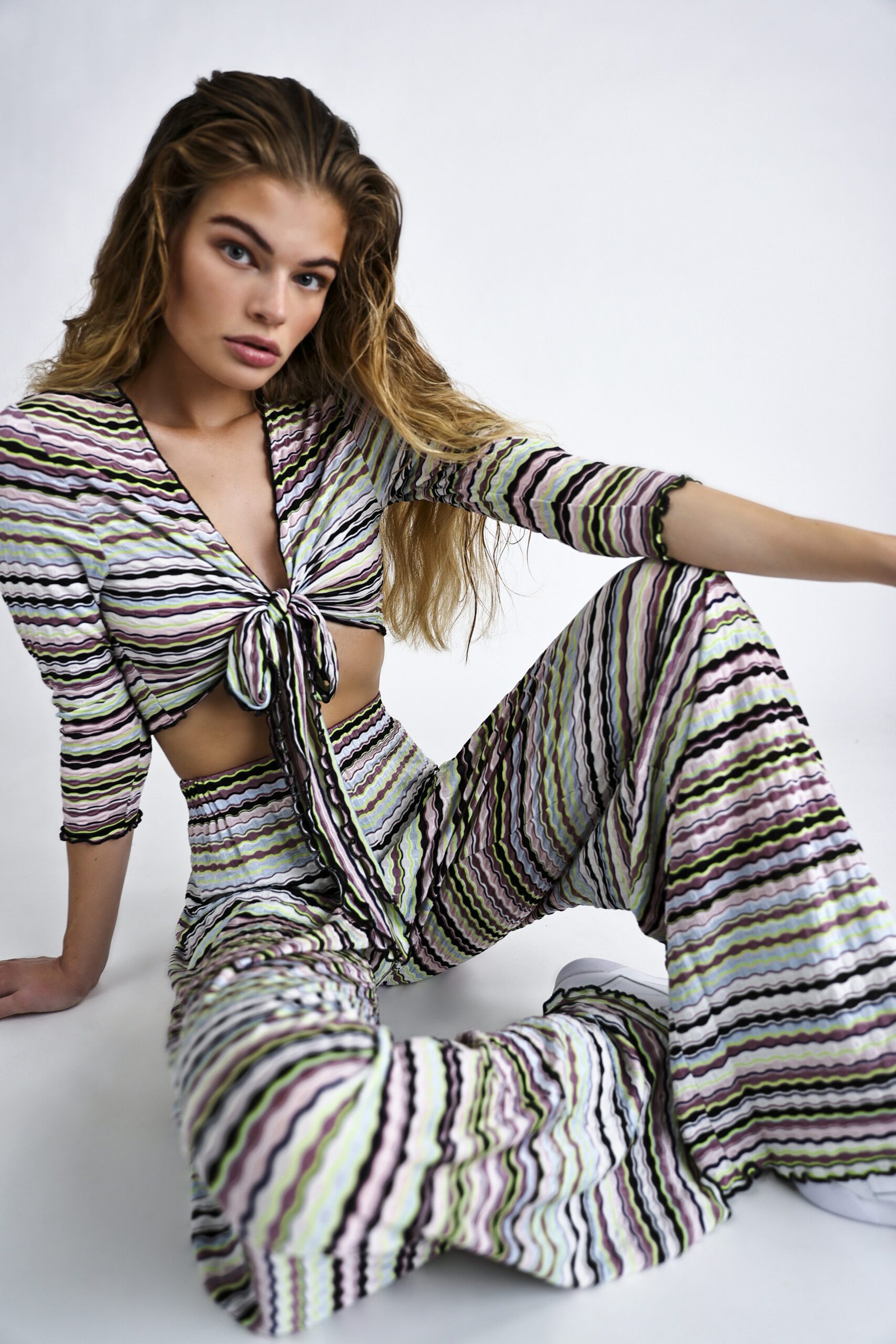 multi-colored flared pants and top