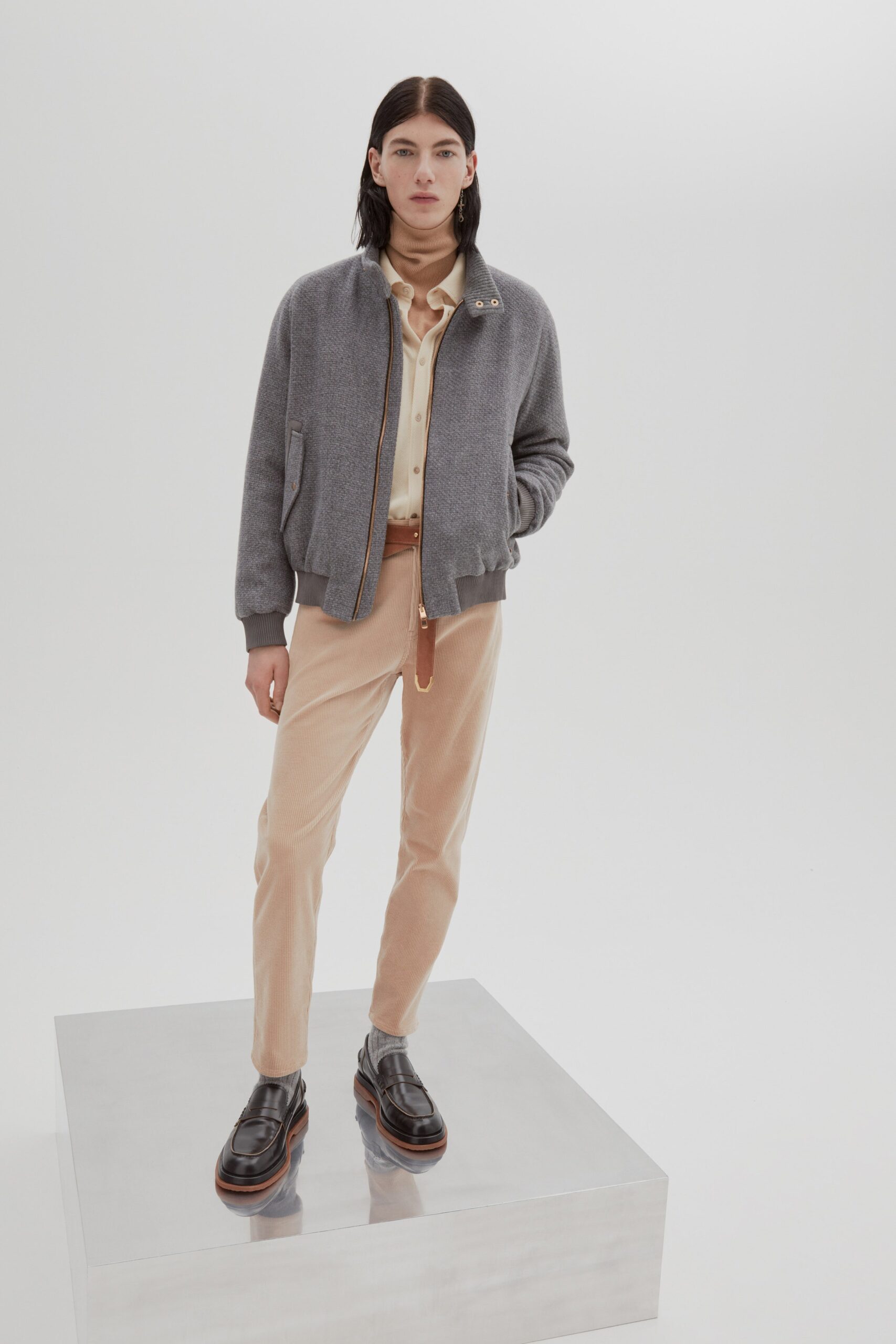 gray wool jacket with beige shirt