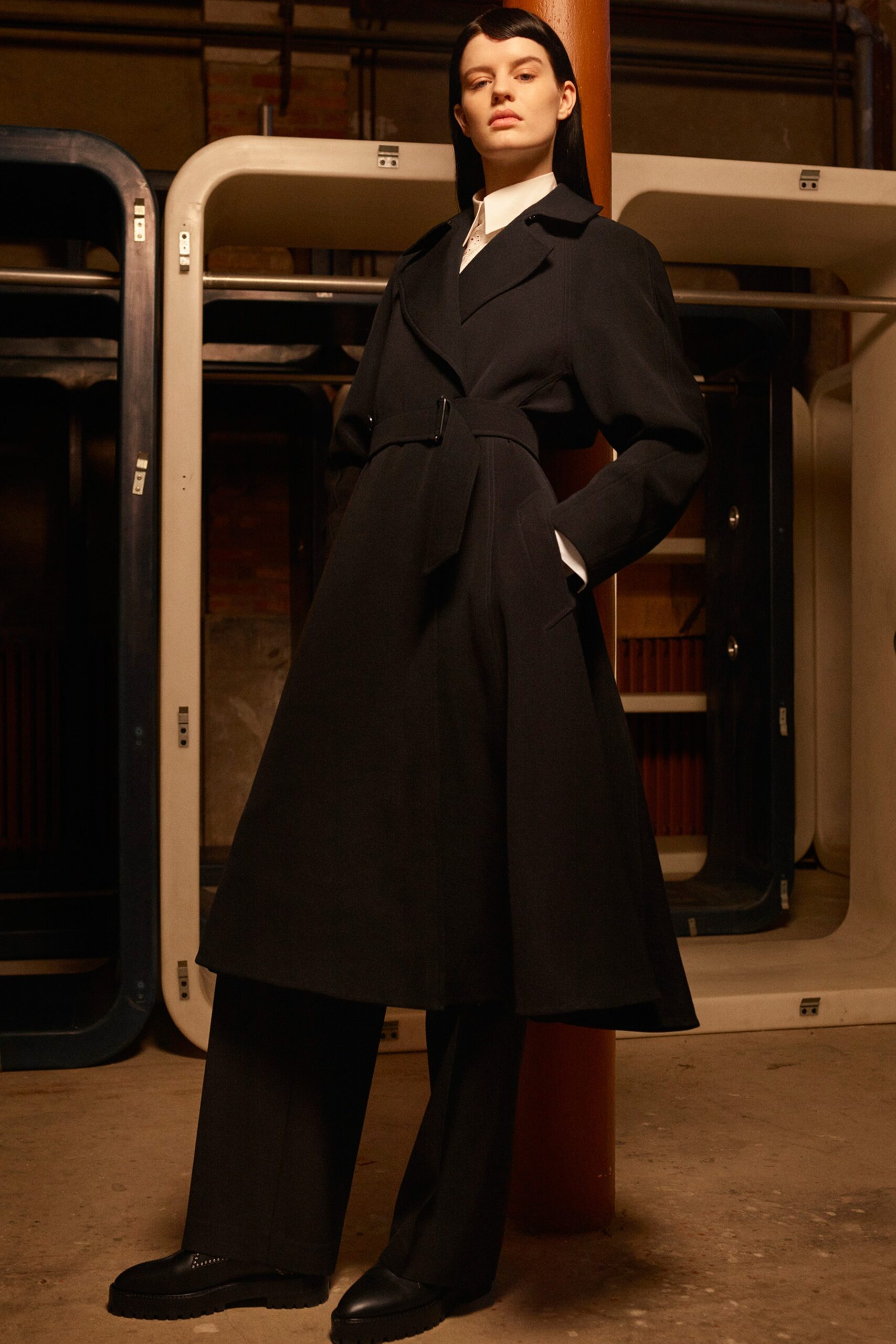 black wool coat and tailored pants