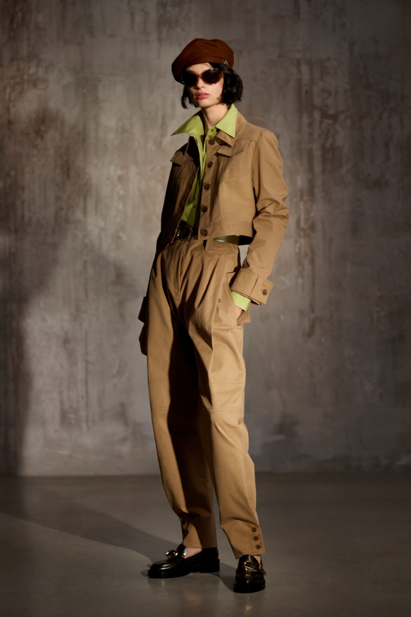 beige jacket green shirt relaxed pants
