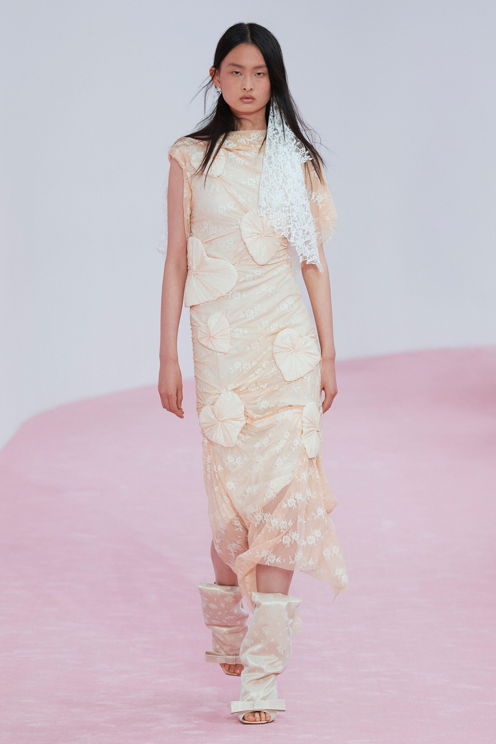 peach lace midi dress with white boots