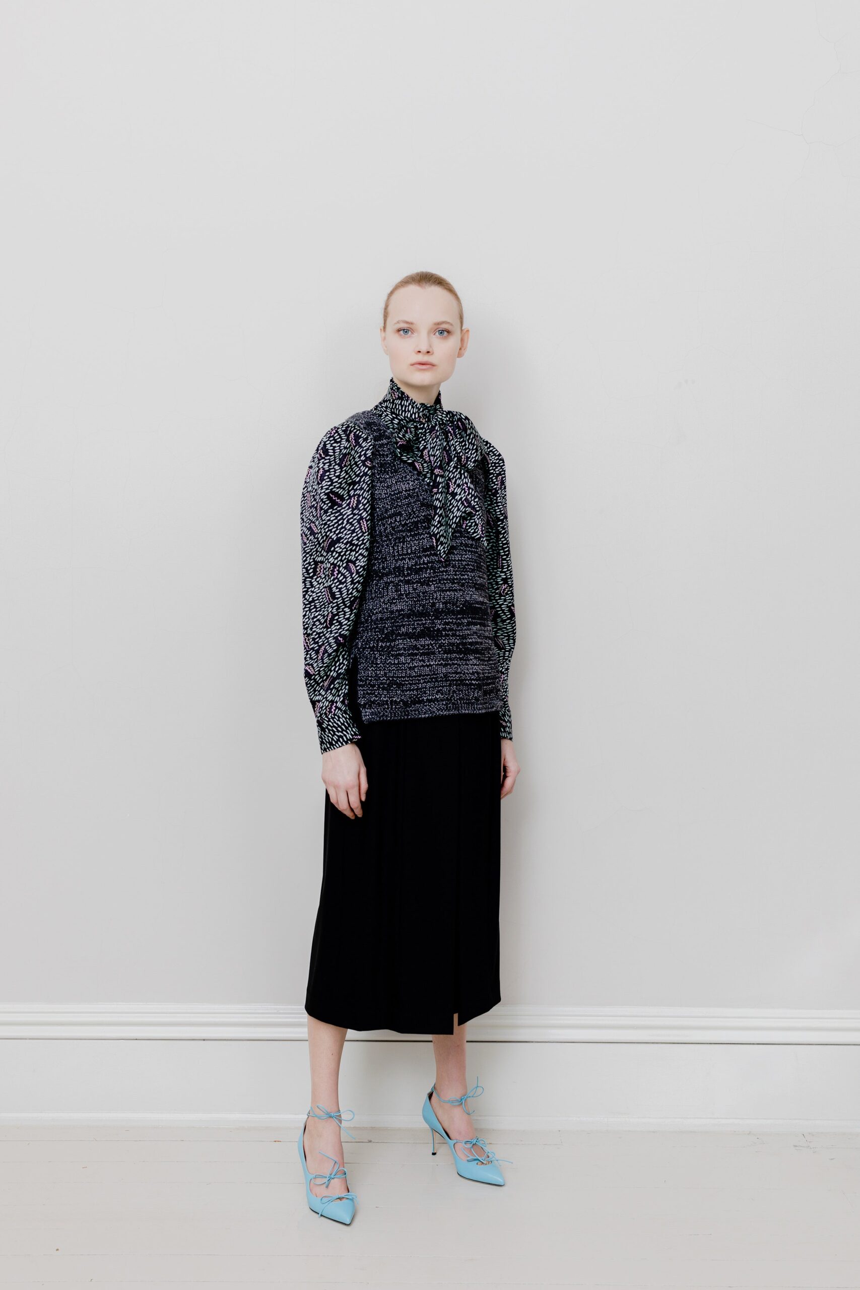 black blouse with blue skirt