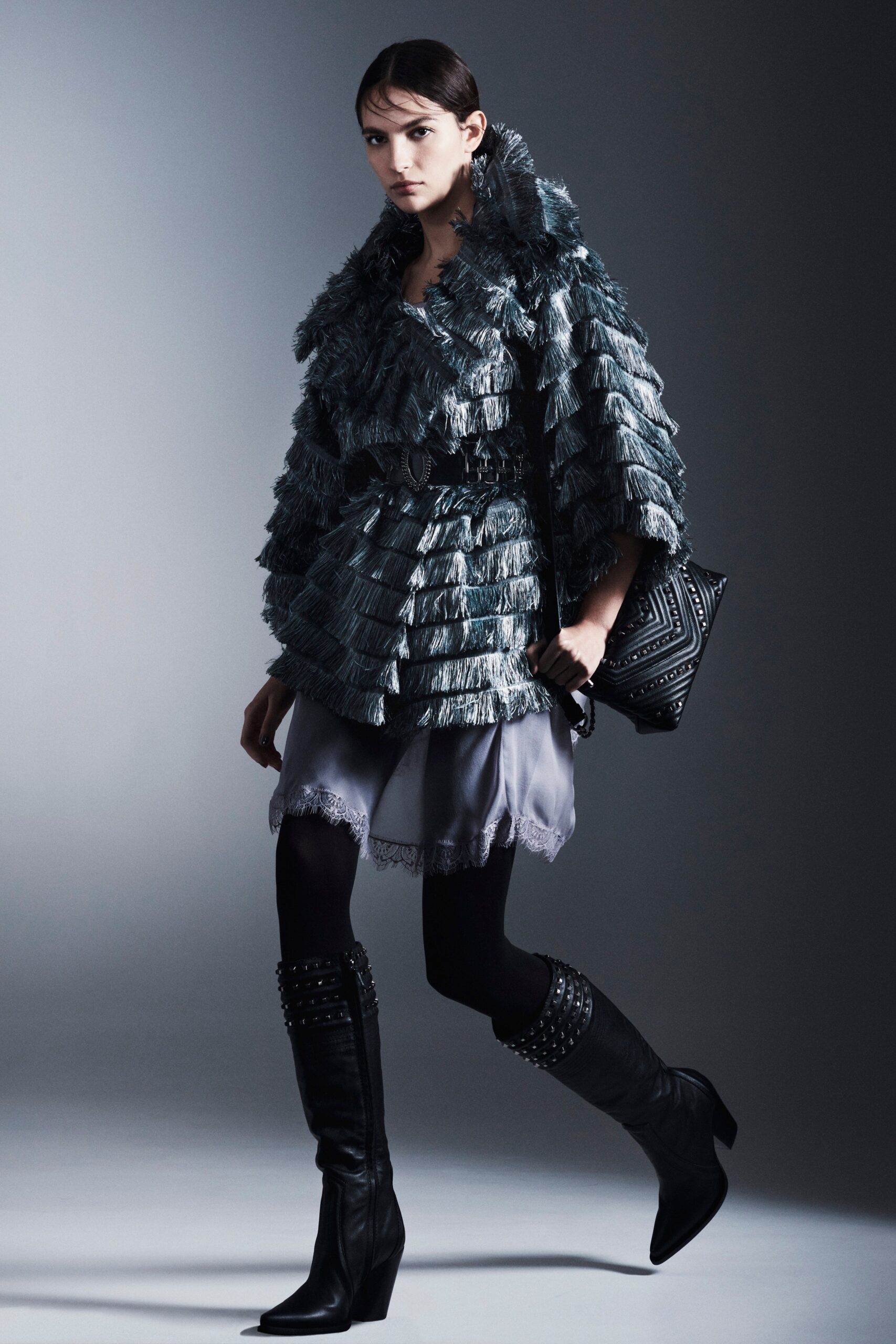 gray fringed coat with mini skirt