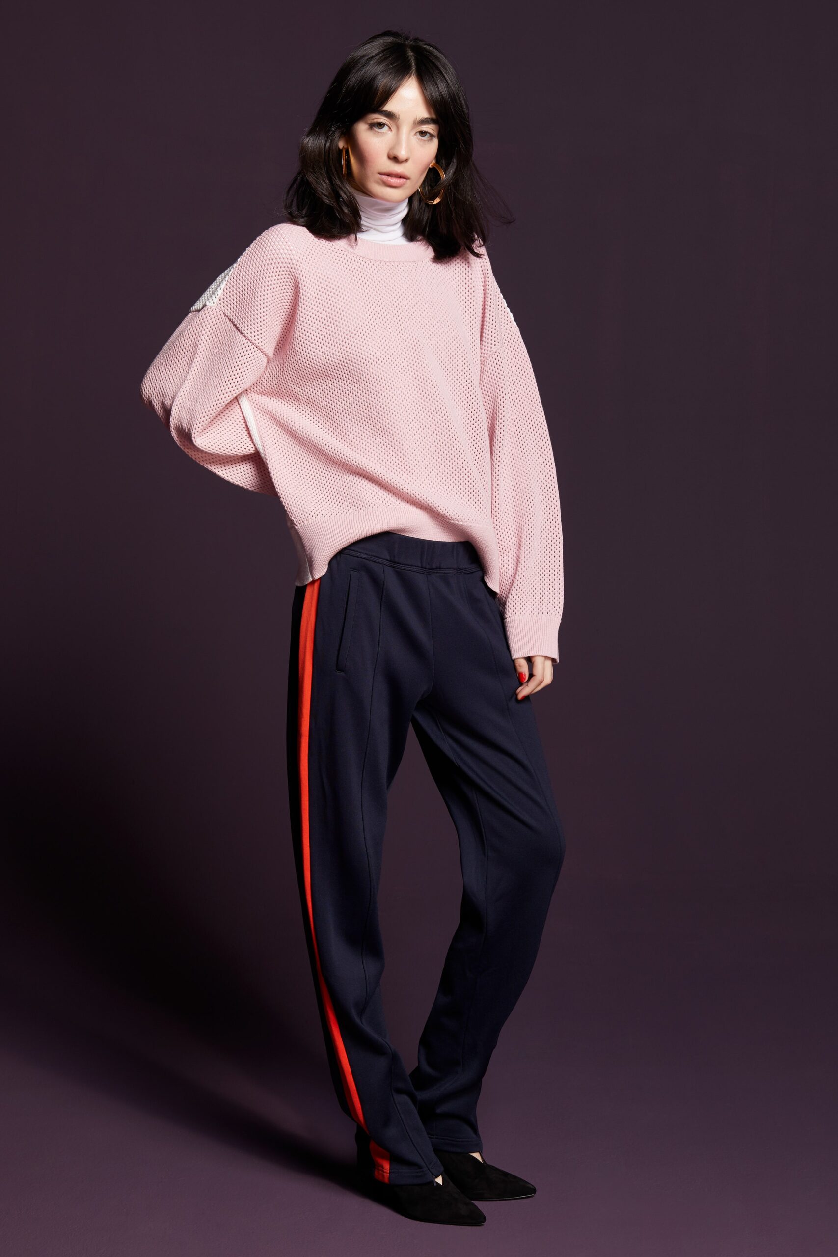 pink oversized sweater and tailored pants