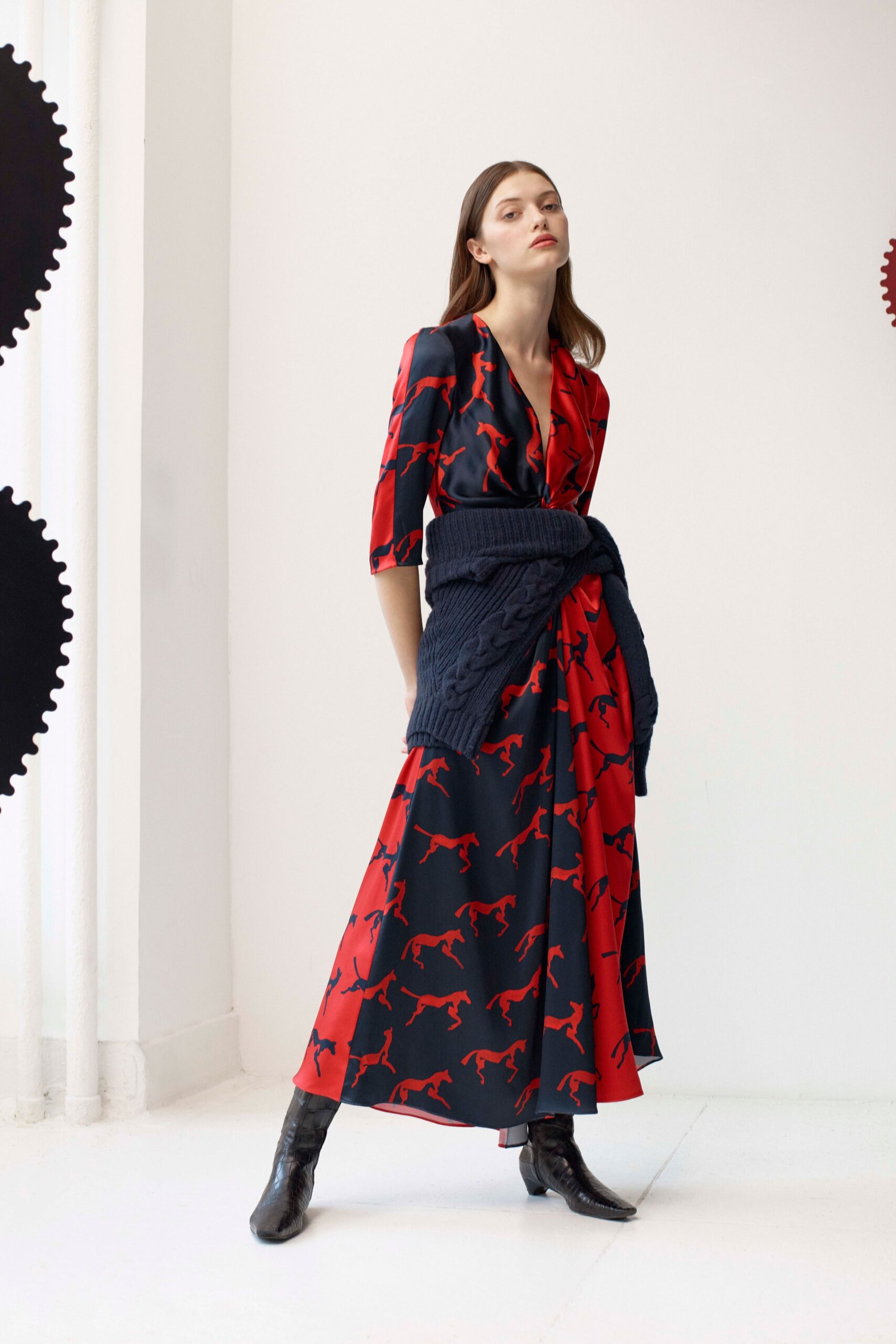 red and black printed maxi dress with navy sweater