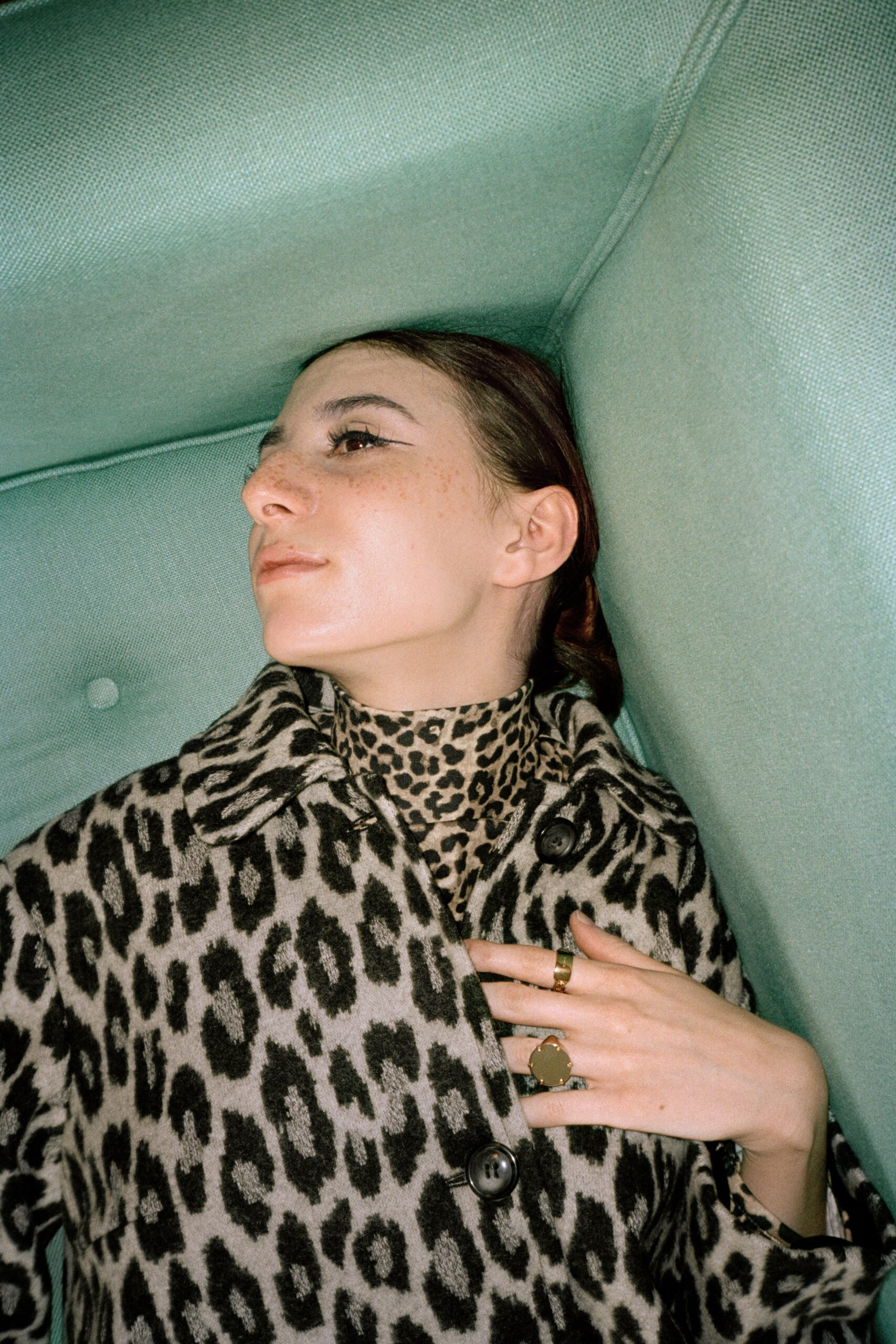 animal-print coat with turtleneck top