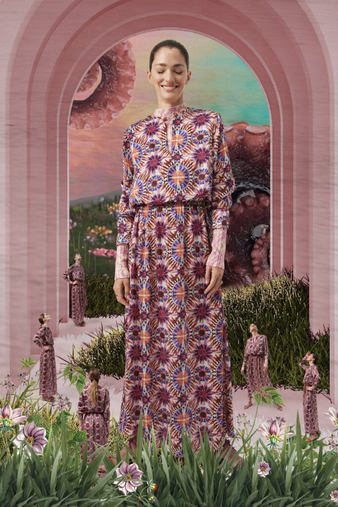 A relaxed multicolor silk dress with long sleeves and a collared neckline featuring a vibrant print.