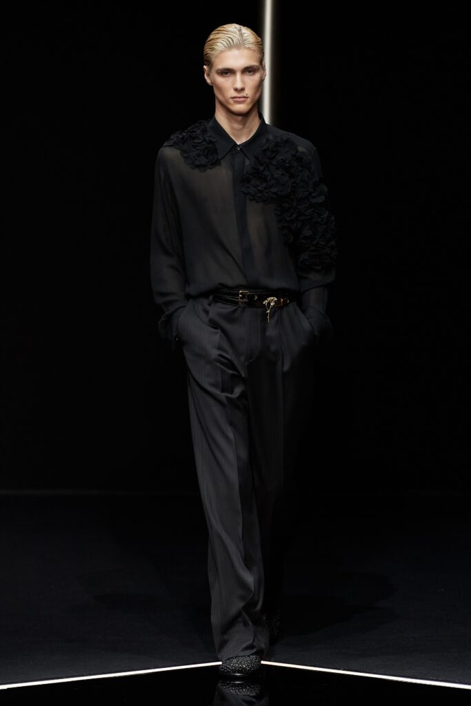 black silk shirt and tailored pants