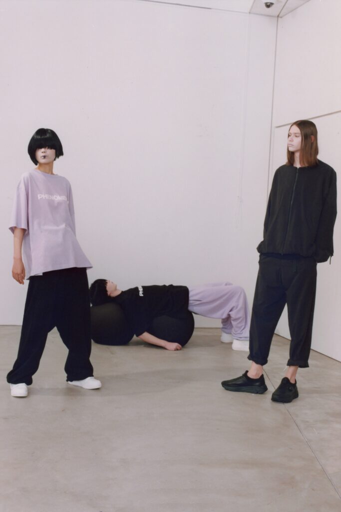 A relaxed black cotton top with short sleeves paired with matching relaxed pants.