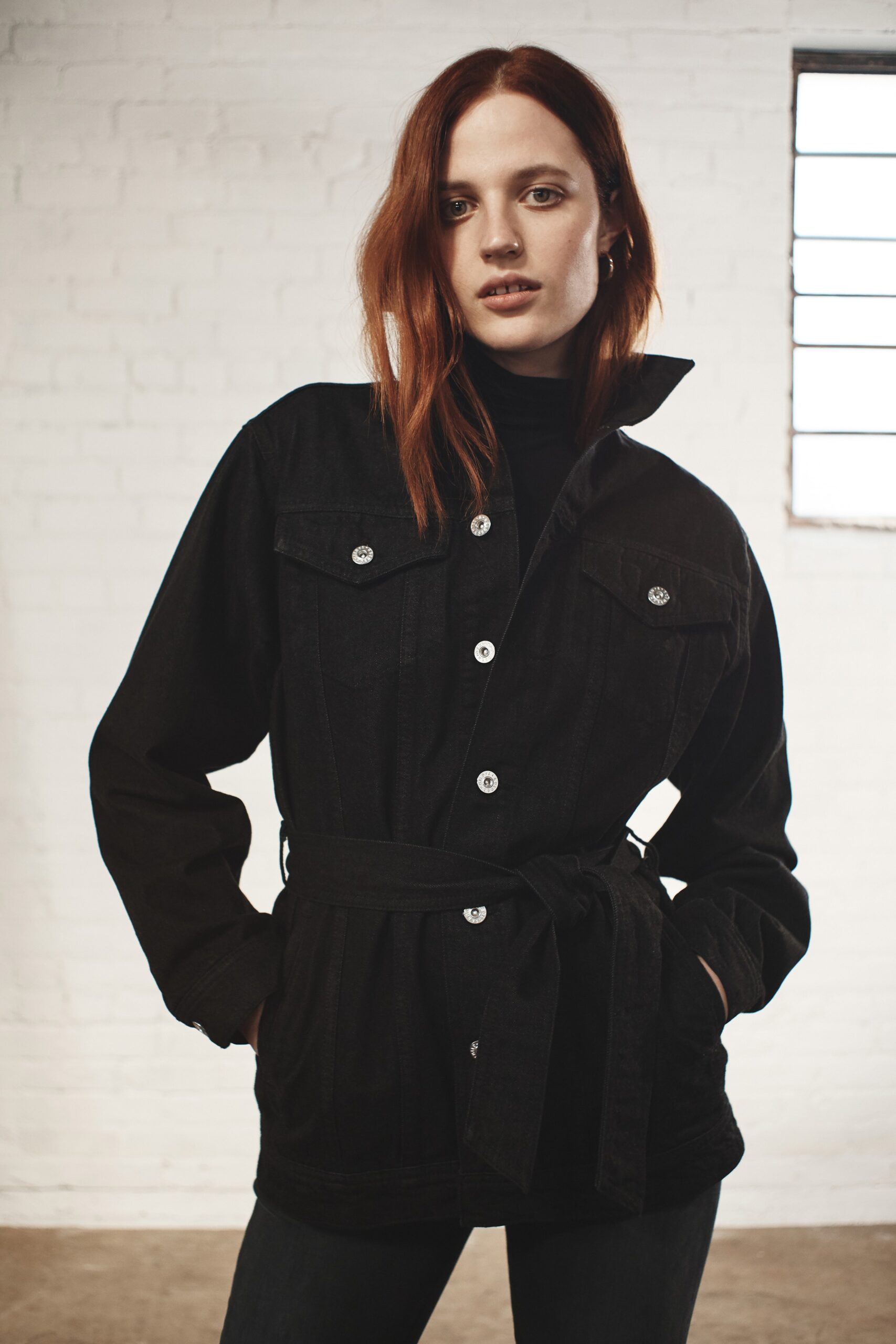 black denim long-sleeve collared fitted buttoned belted jacket
