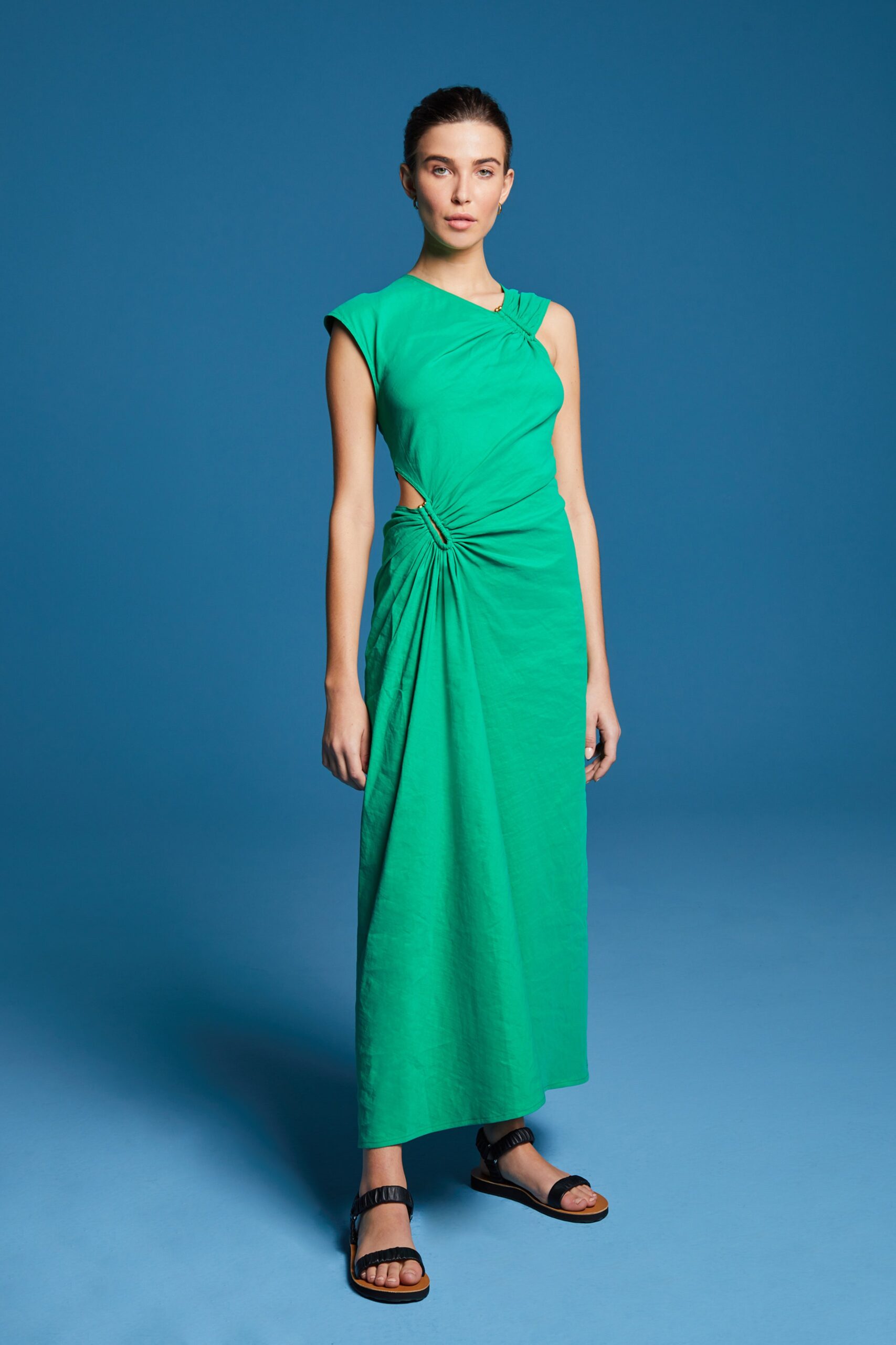 fitted green sleeveless dress