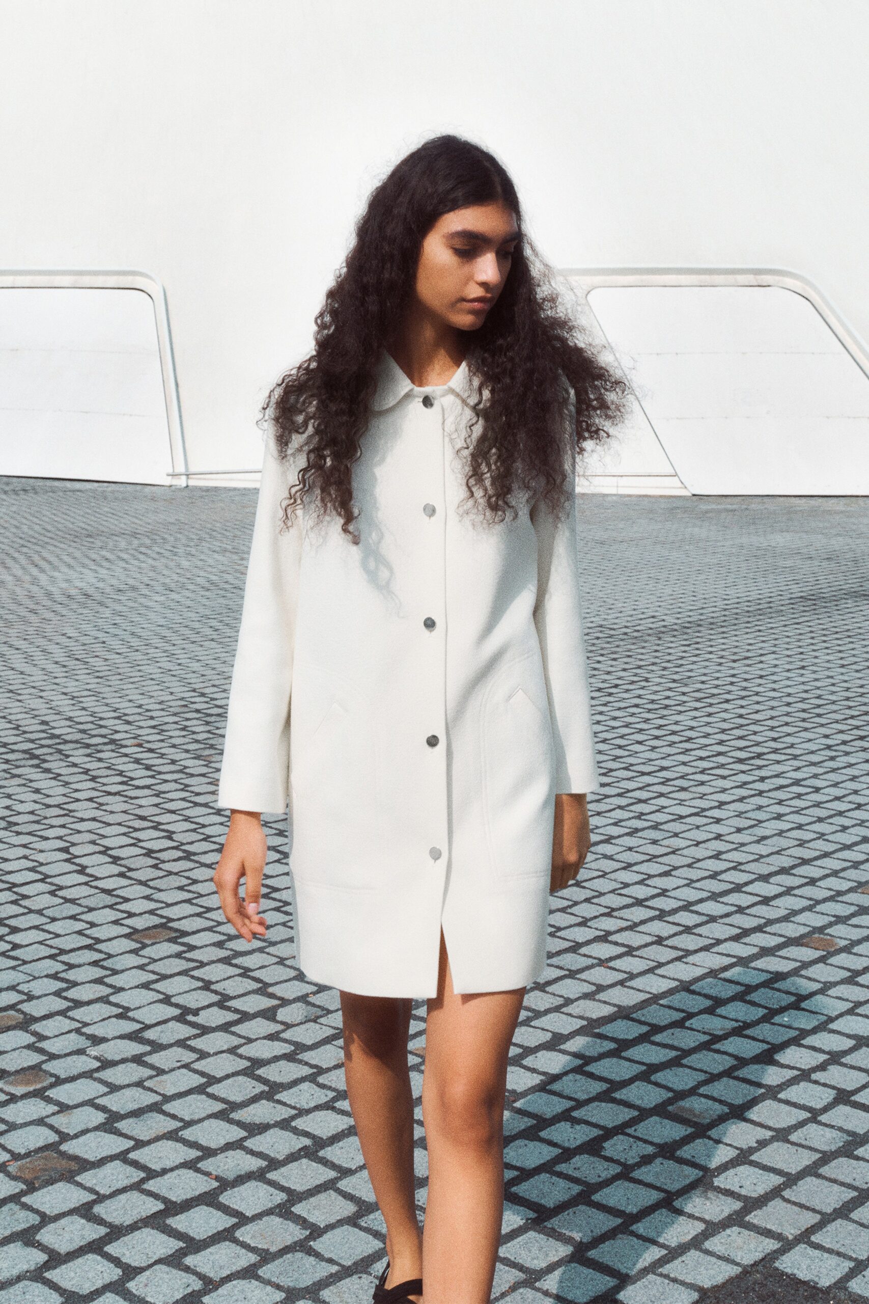 white fitted wool coat