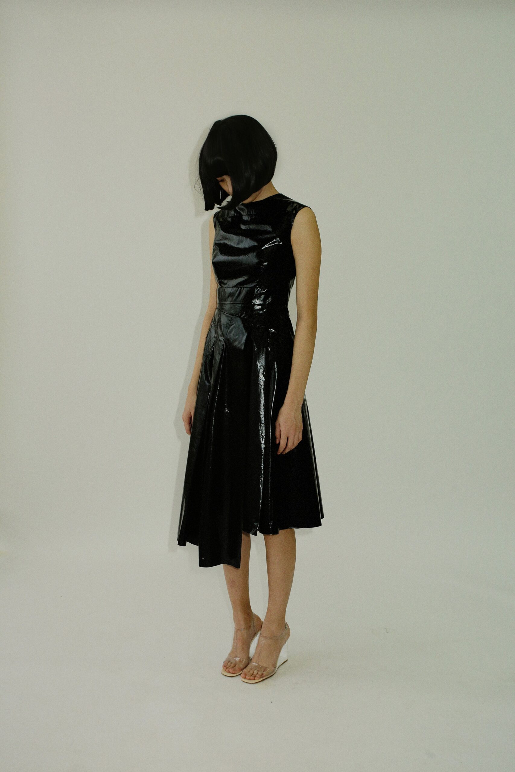 black vinyl sleeveless dress