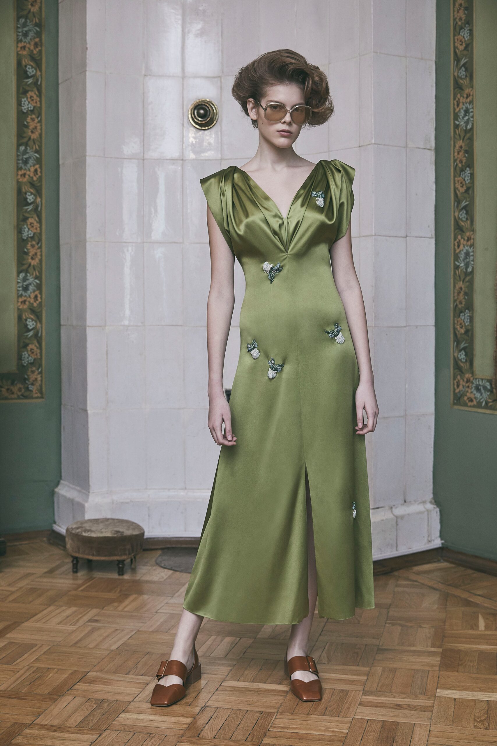 green silk sleeveless v-neck fitted draped midi dress
