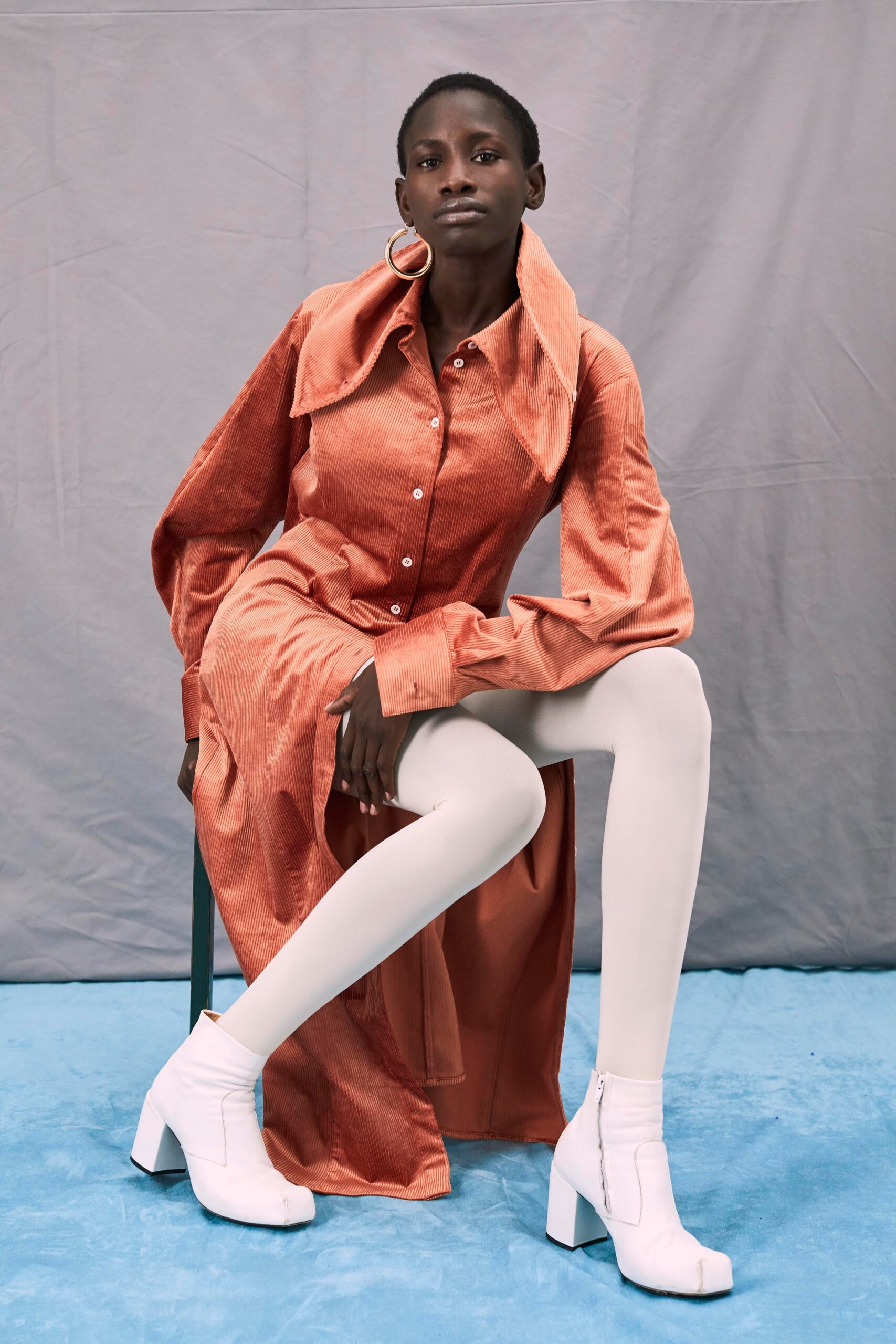 orange silk long-sleeve collared fitted buttoned flared dress