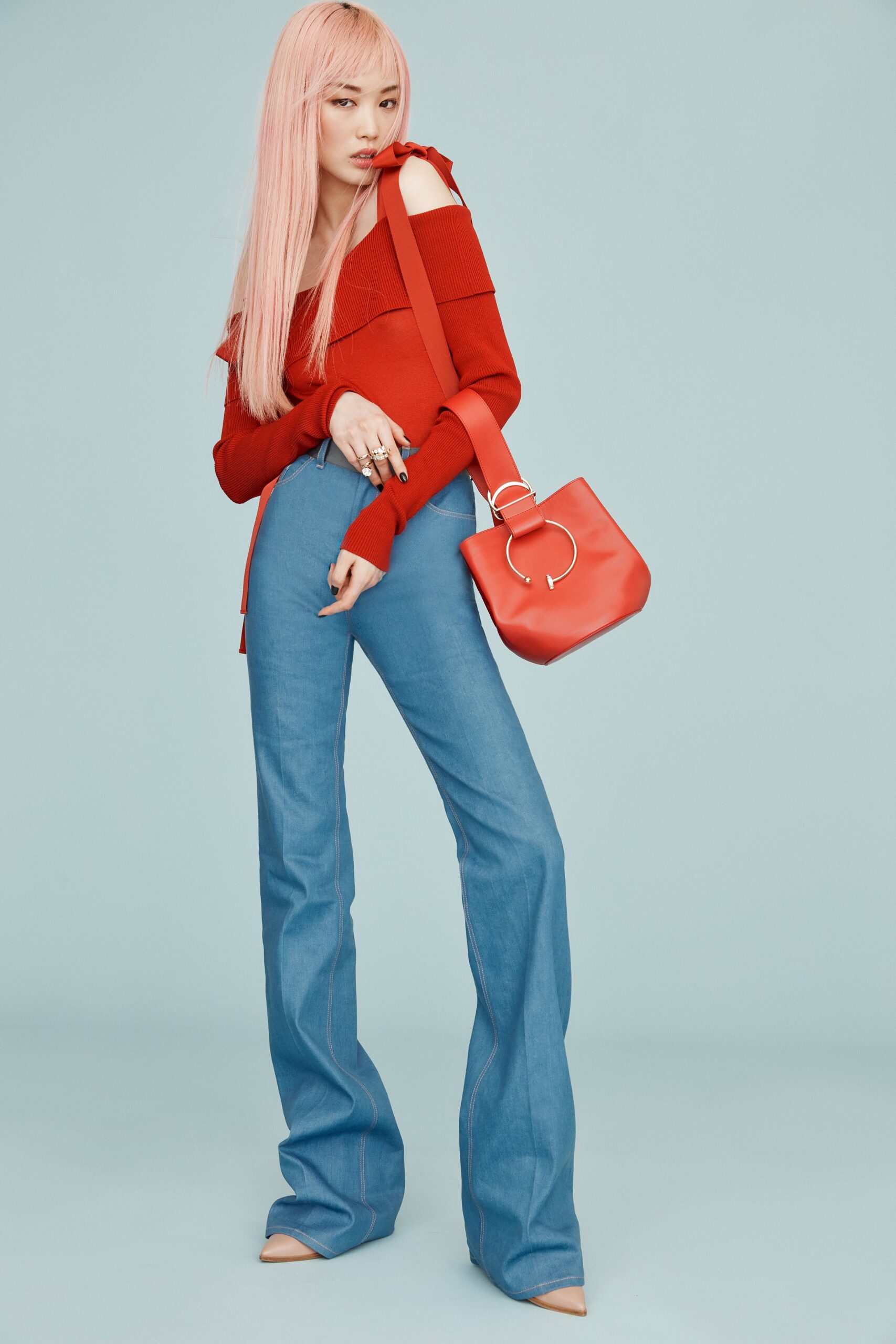red off-shoulder top with flared pants