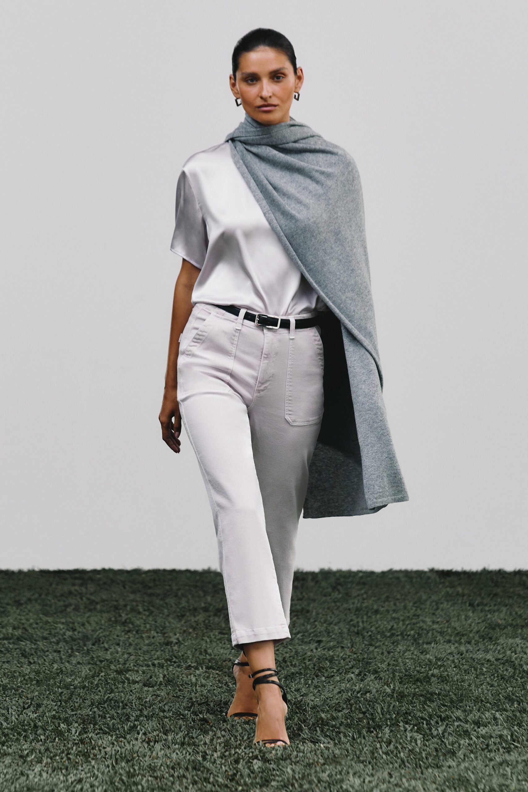 white silk top with beige pants