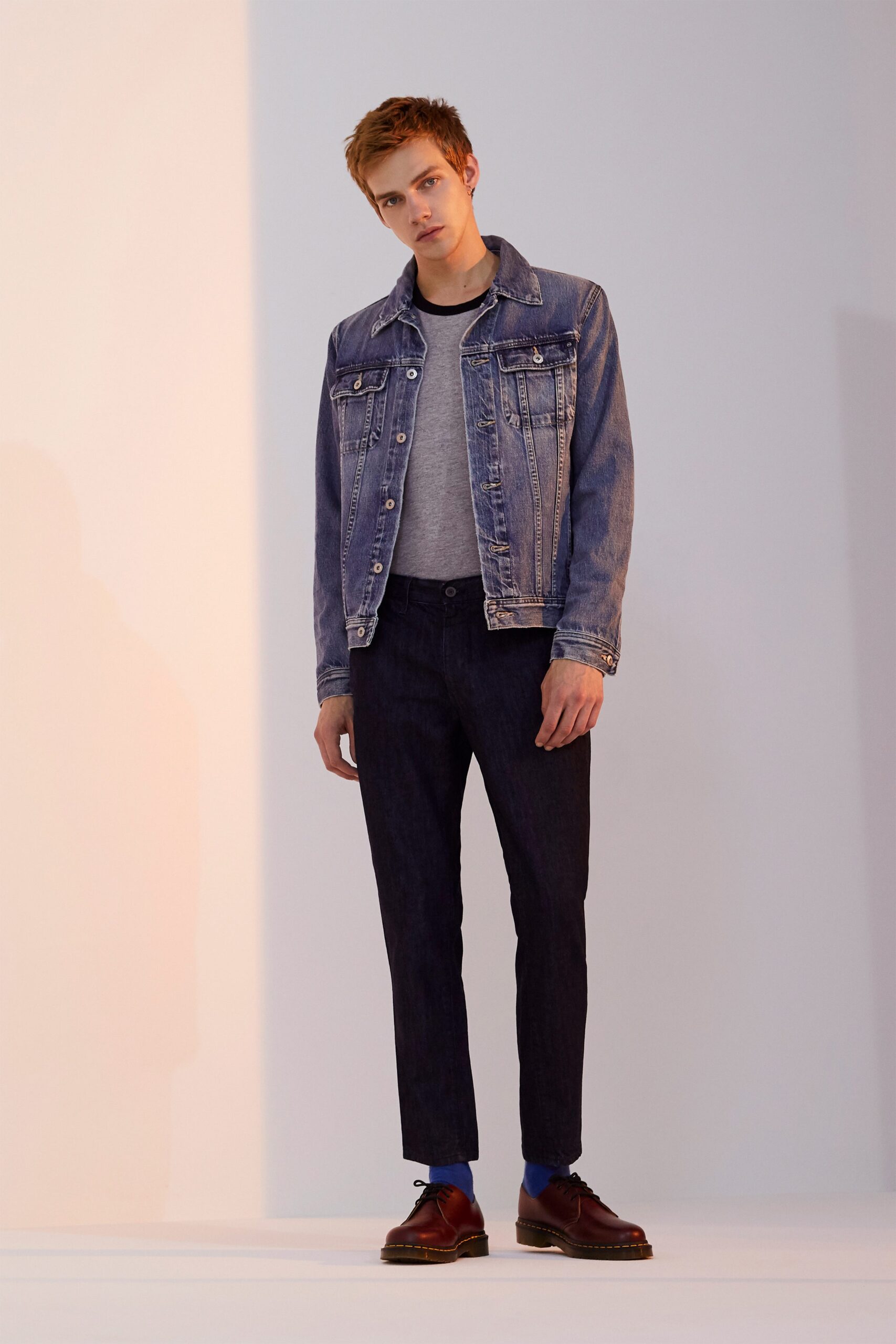 blue denim jacket gray shirt black pants