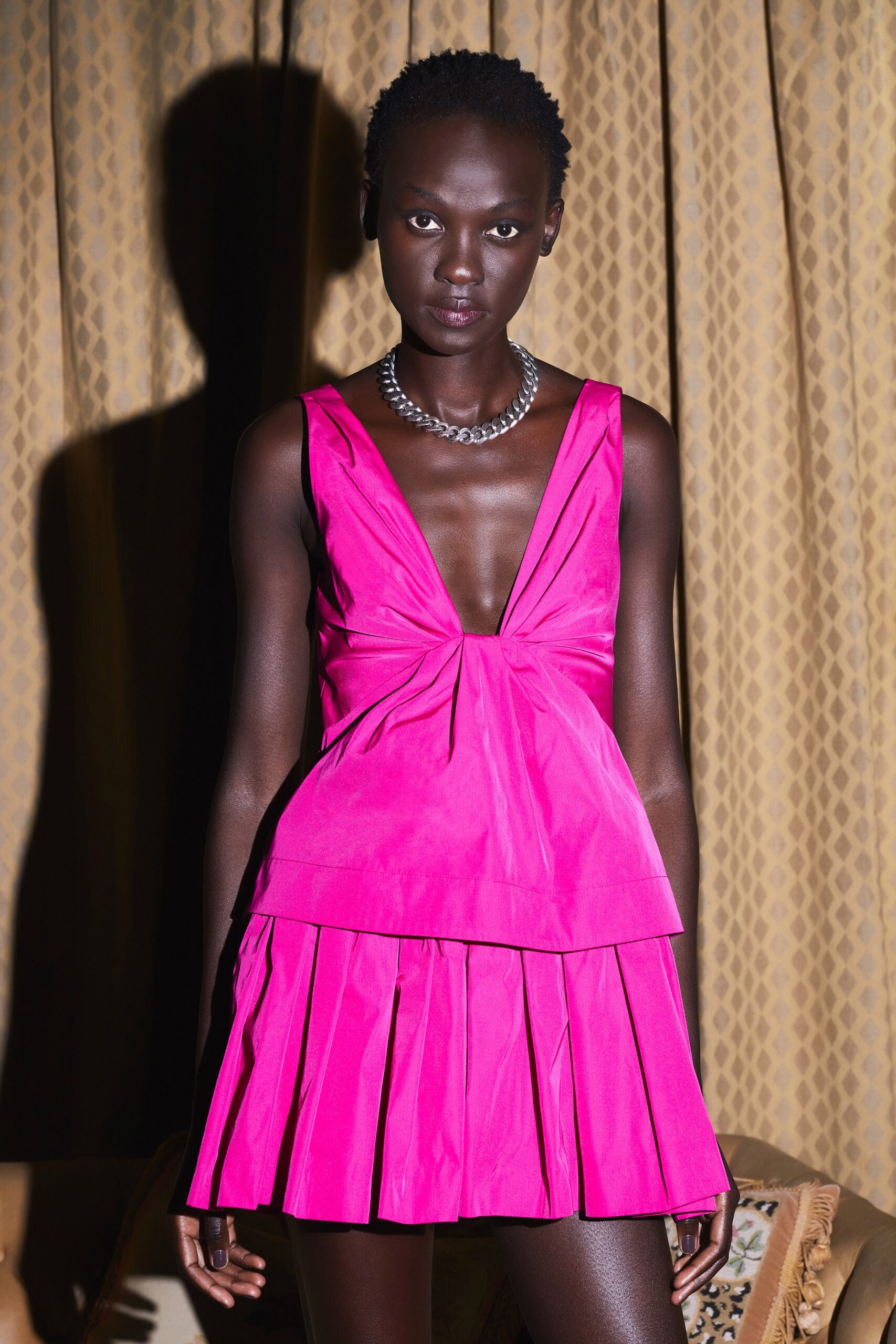 fitted pink sleeveless dress