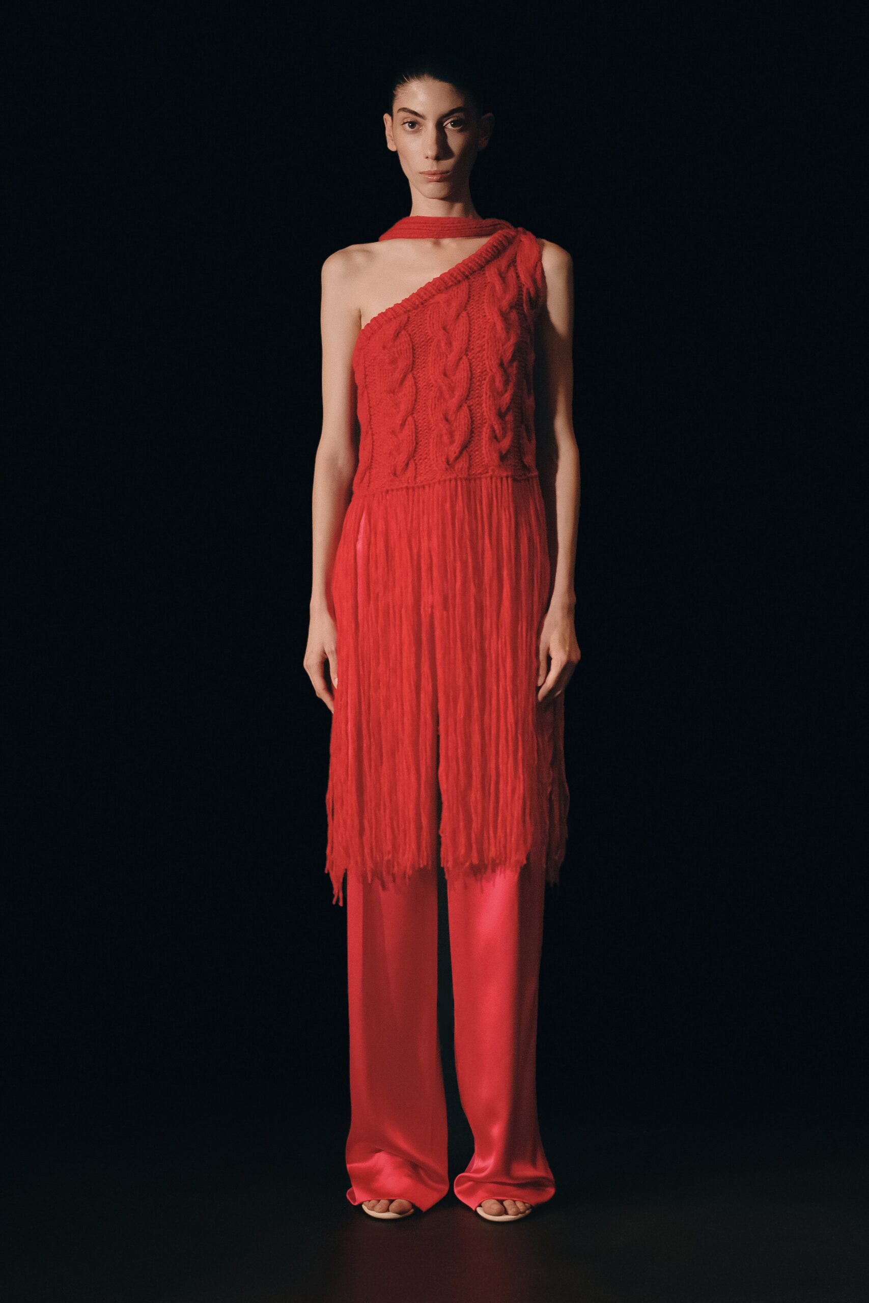 red fringed midi dress with pink pants