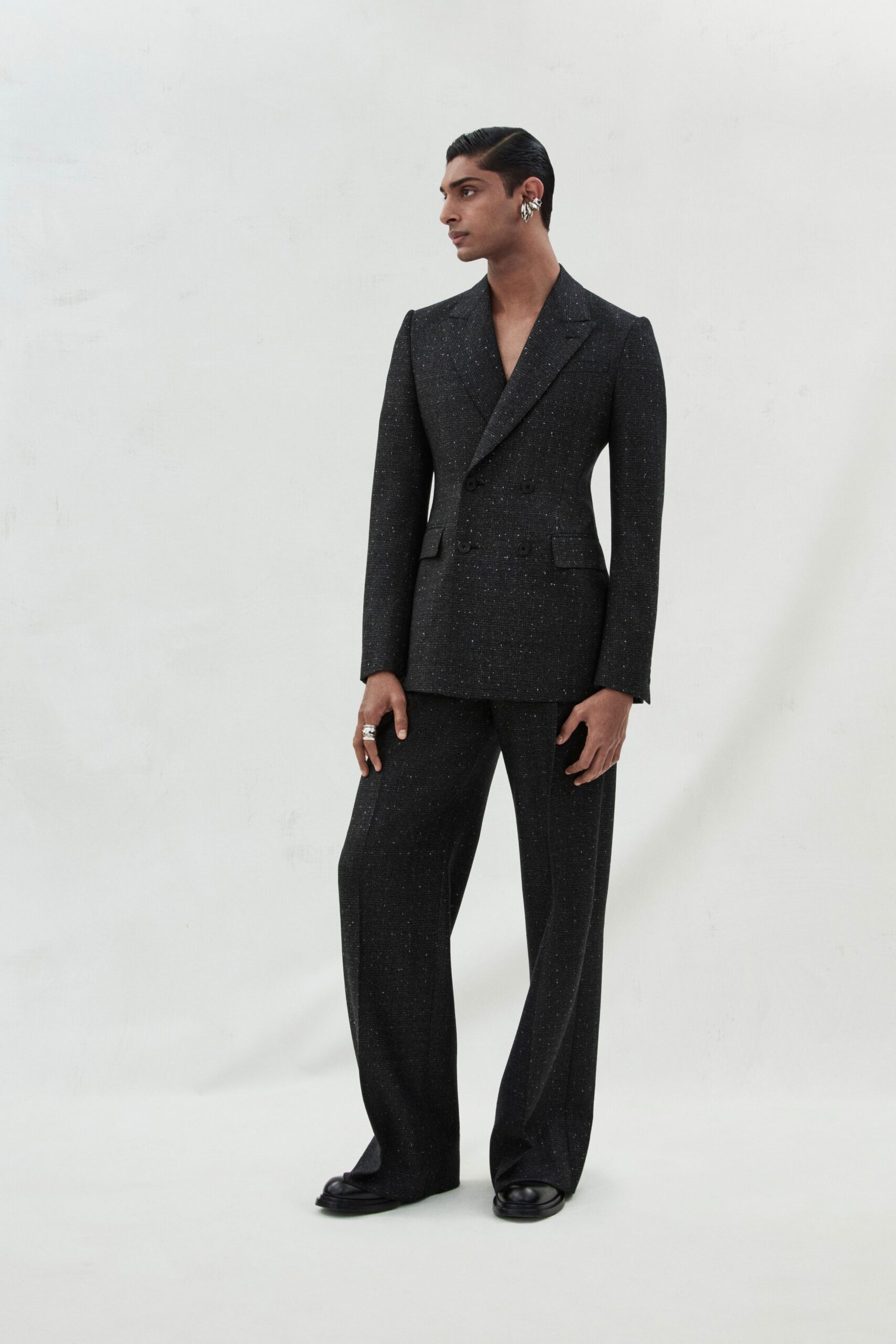 black wool long-sleeve collared tailored structured buttoned suit
