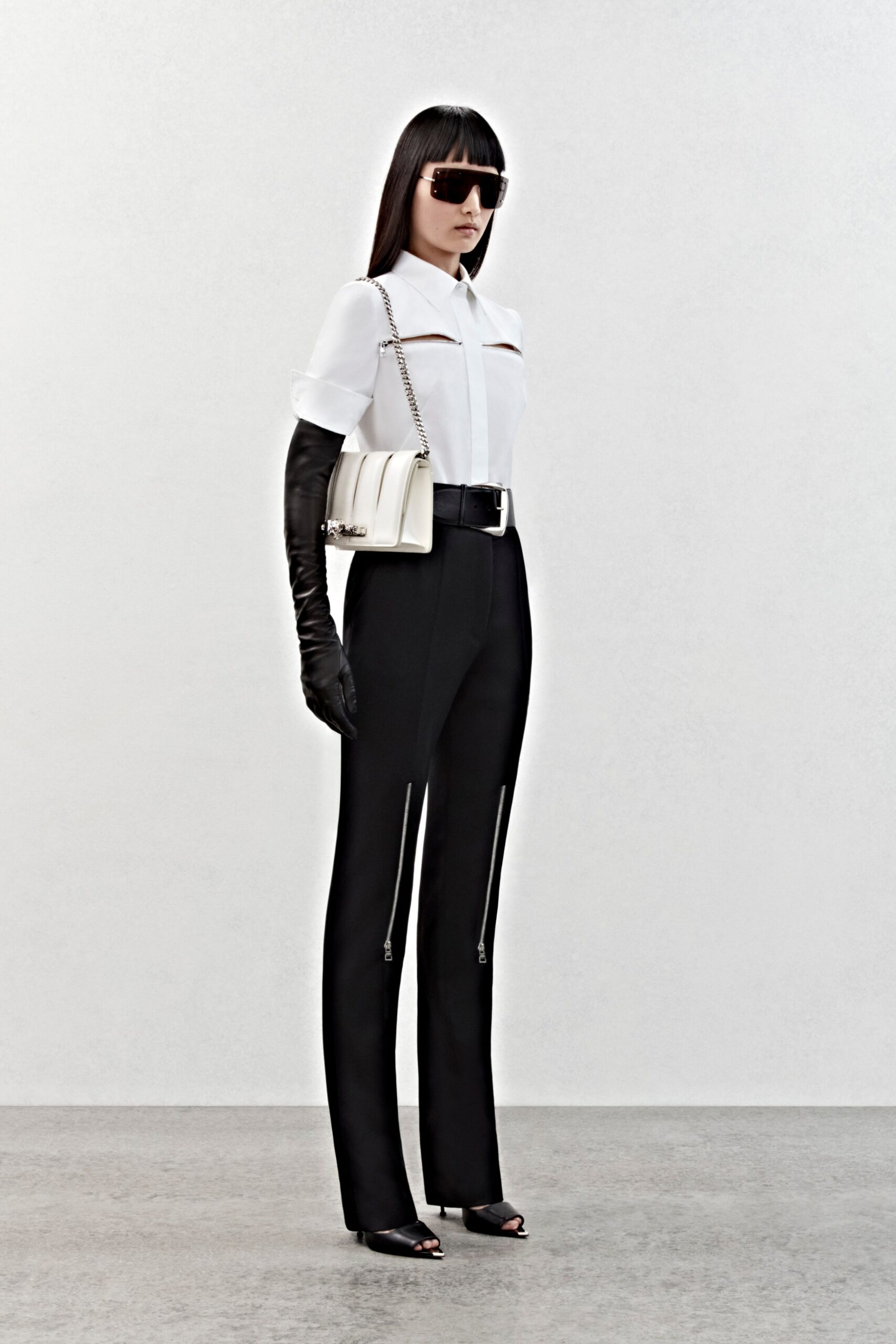 white fitted shirt and black pants