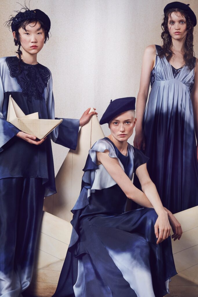 blue silk dresses and black hat