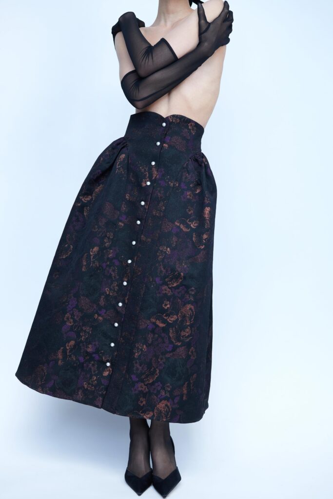 black silk midi skirt and top